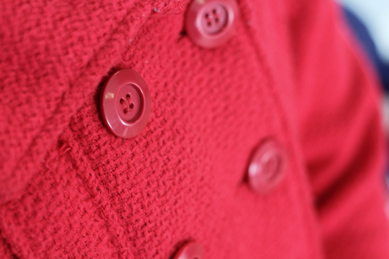 Canon EOS 60D + Canon EF 50mm F1.8 II sample photo. Coat, button, red photography