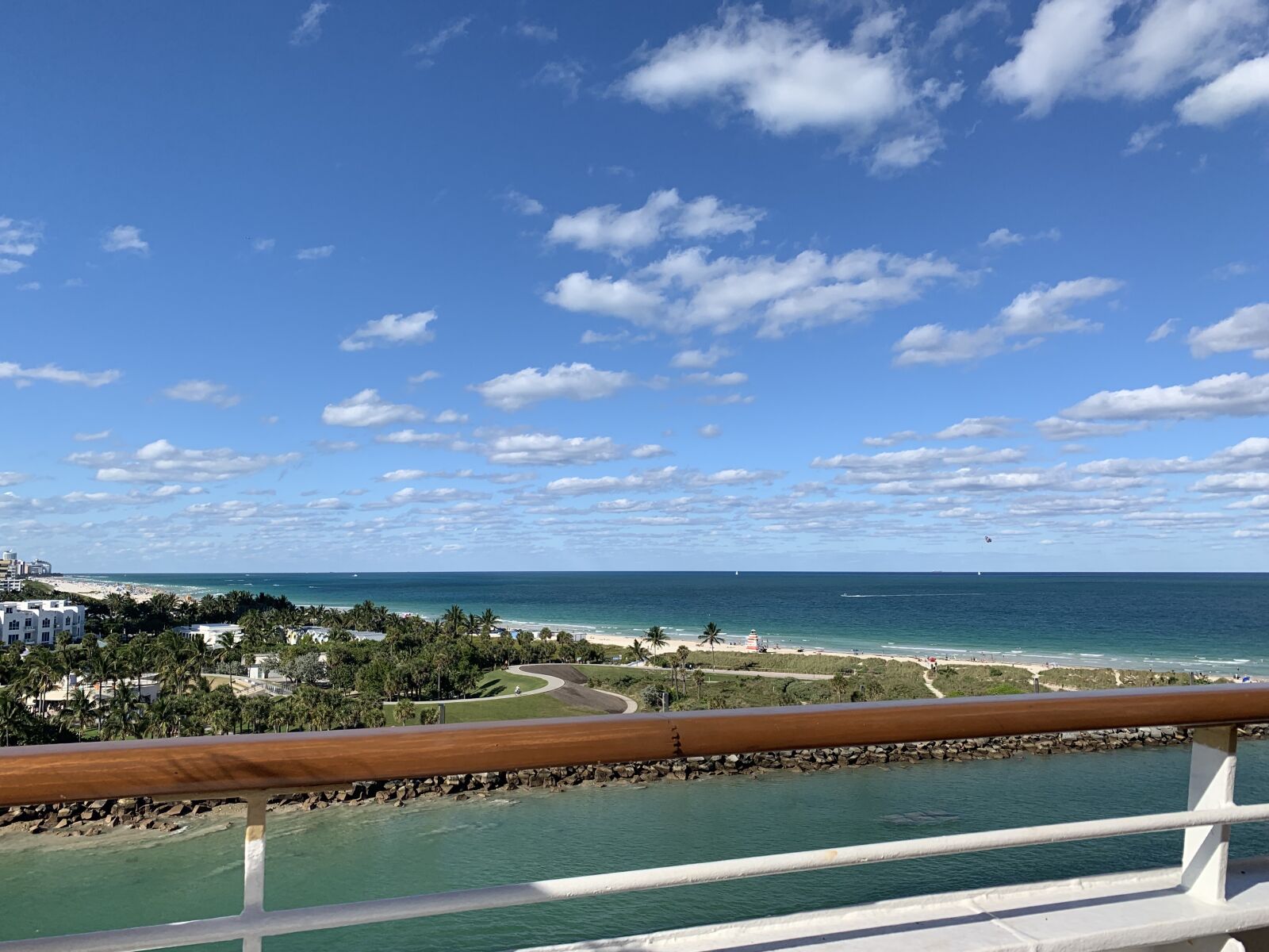 Apple iPhone XR sample photo. Clouds, blue, beach photography