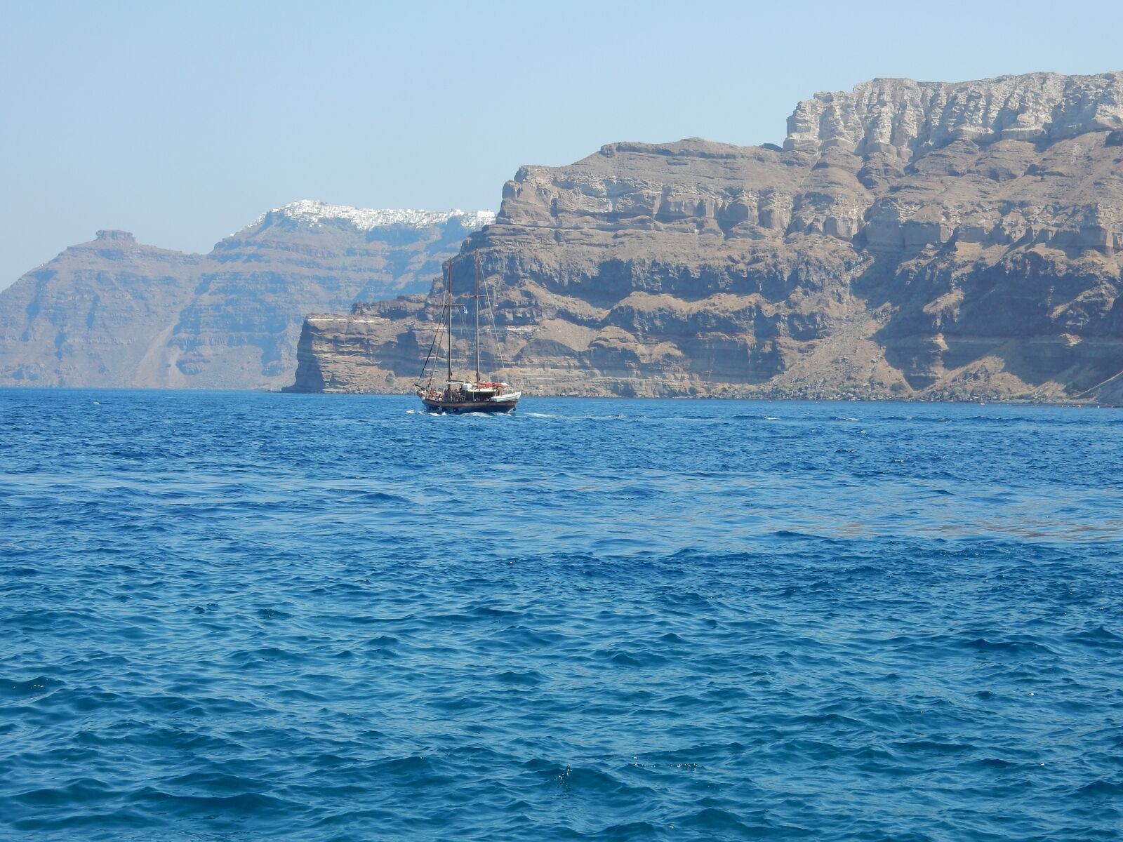 Nikon Coolpix S9900 sample photo. Sea, boat, mountain photography
