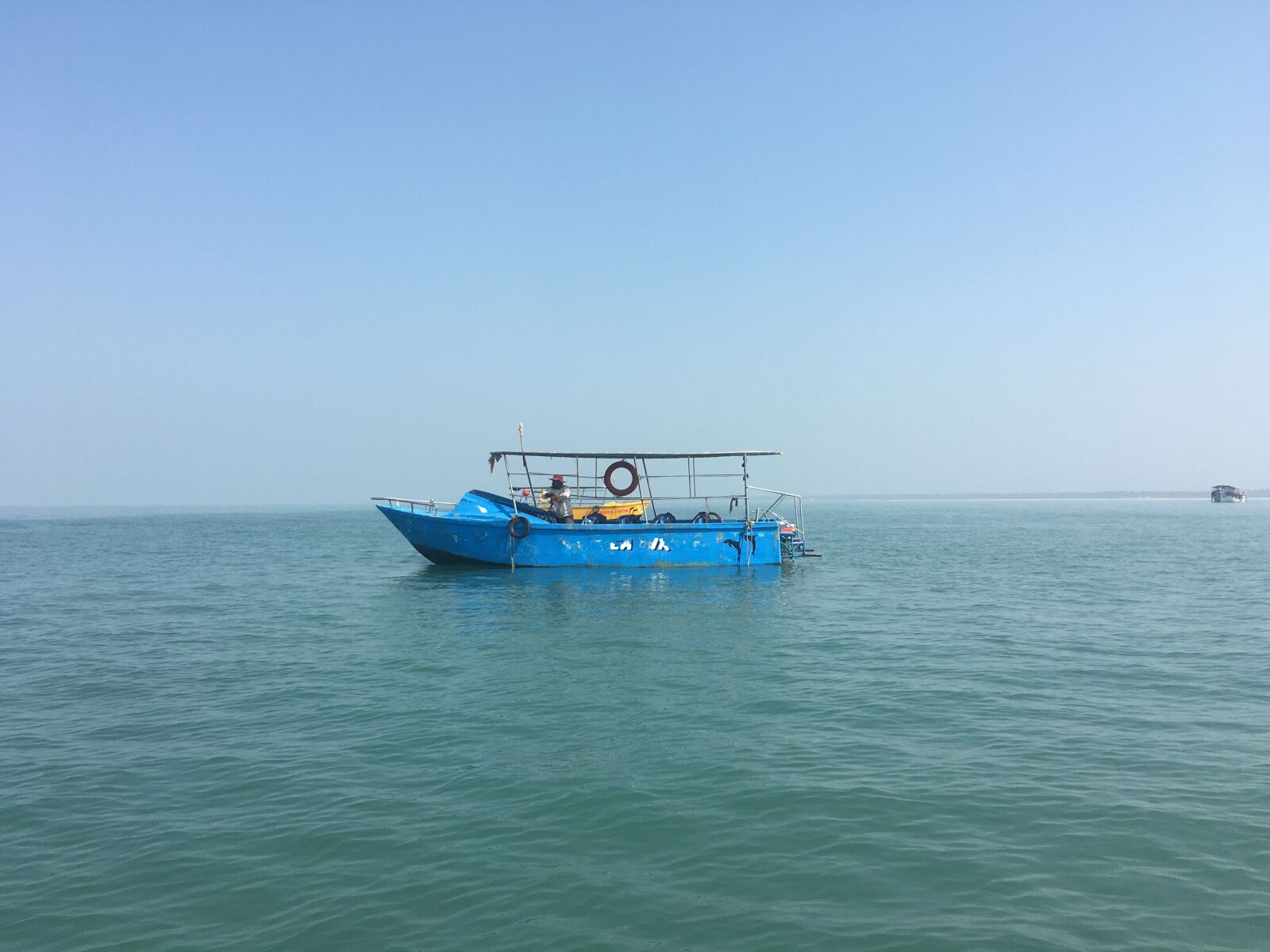 Apple iPhone 6s sample photo. Boat, sea, blue sky photography