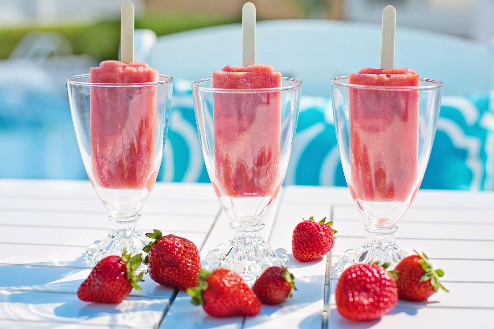 Canon EF 50mm F1.4 USM sample photo. Popsicles, strawberry popsicles, red photography