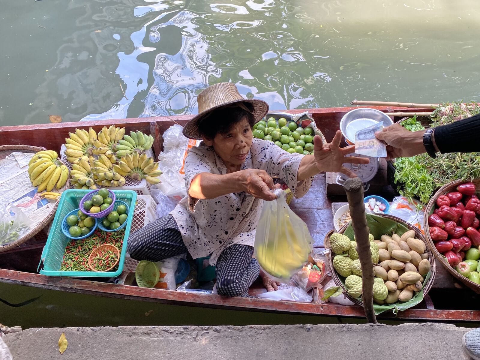 iPhone 11 Pro back triple camera 4.25mm f/1.8 sample photo. Woman, floating river, market photography