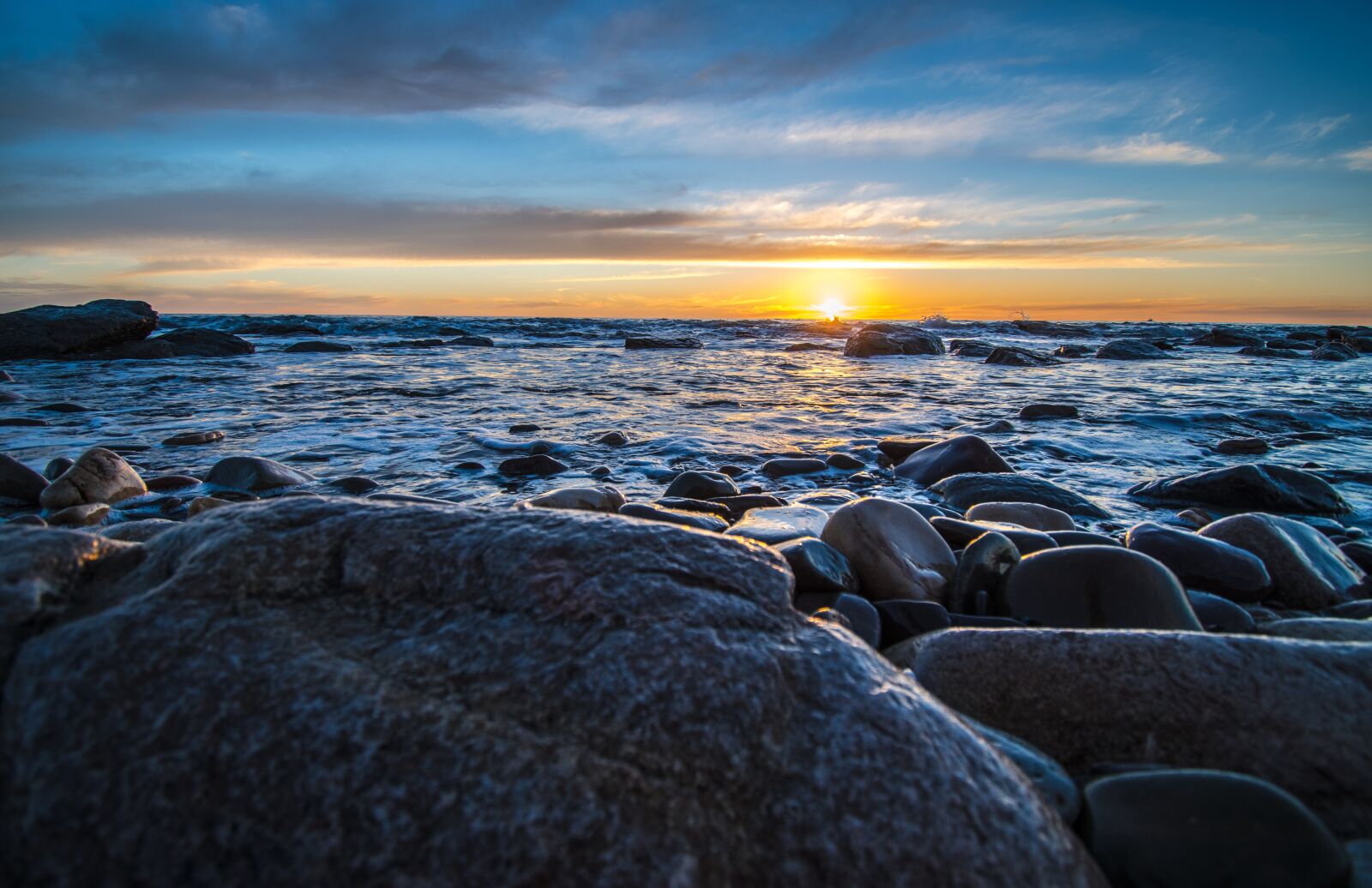 Nikon D5600 sample photo. Sunset, rocks, beach photography