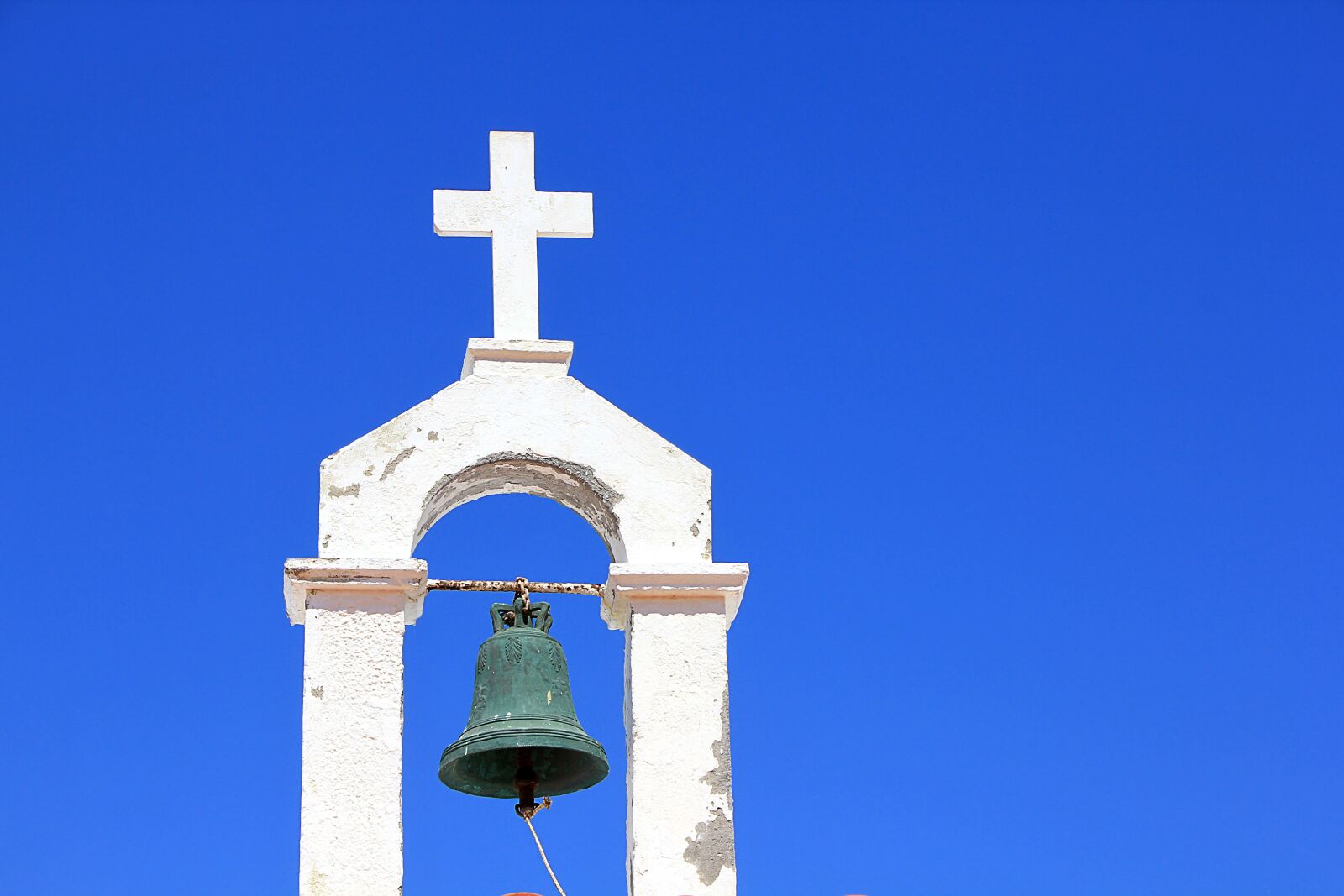 Canon EOS 550D (EOS Rebel T2i / EOS Kiss X4) sample photo. Bell, steeple, cross photography