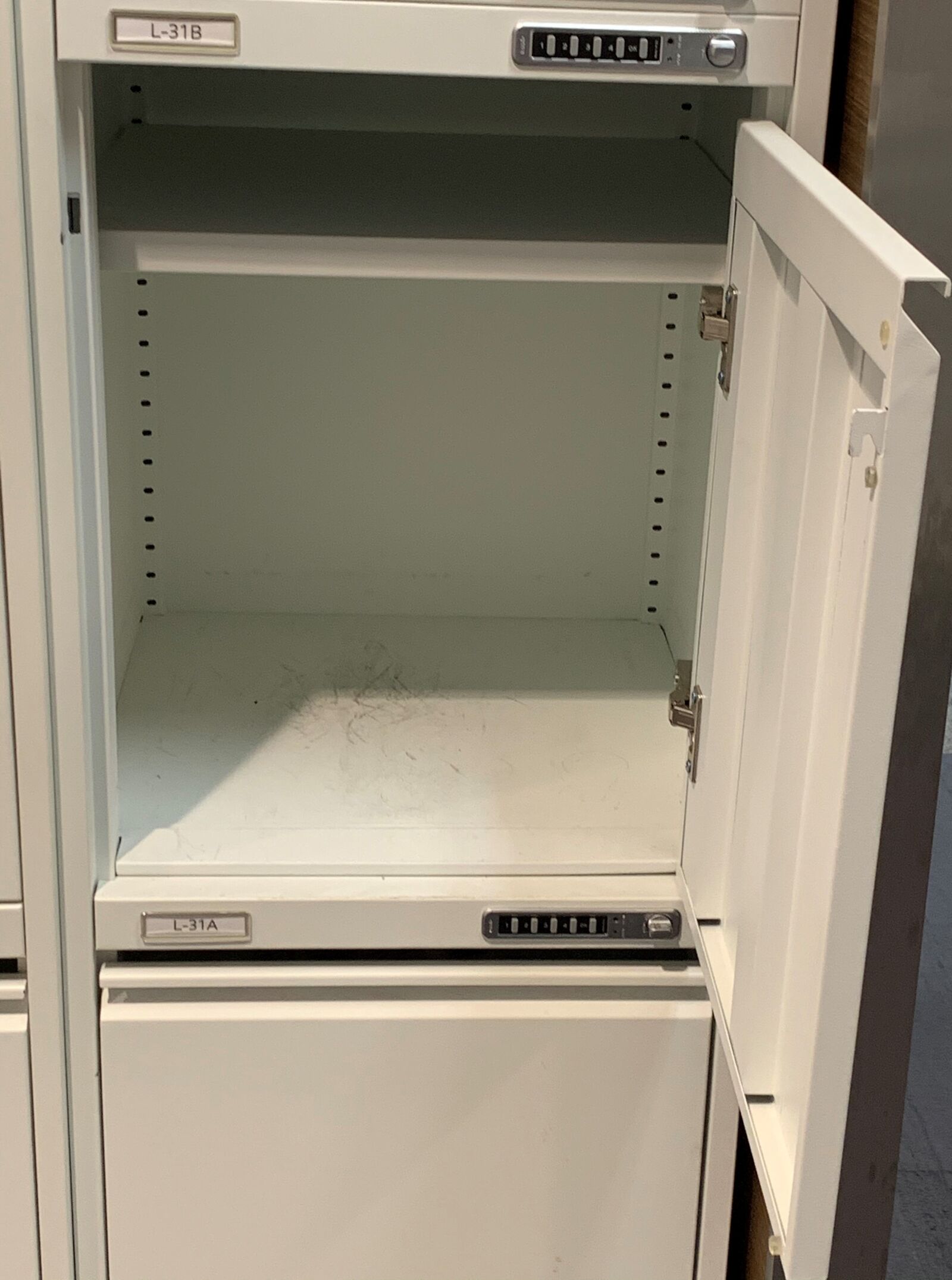 Apple iPhone XR sample photo. Locker, closet, empty photography