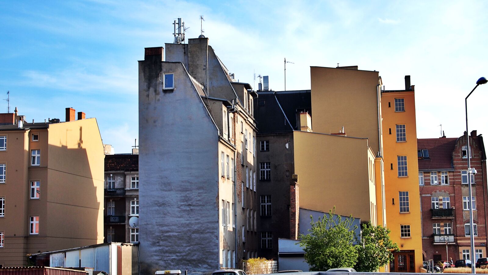 Olympus PEN E-PL1 sample photo. Colorful, houses, old, building photography