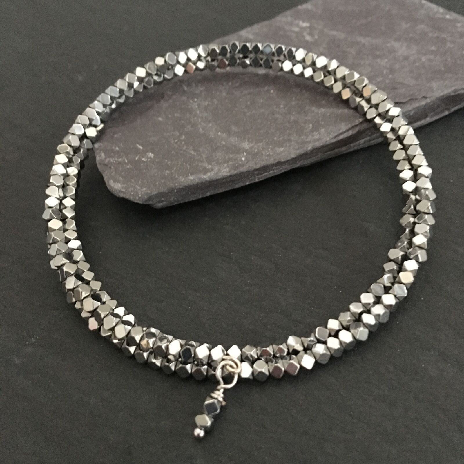 iPhone 6s back camera 4.15mm f/2.2 sample photo. Bracelet, jewellery, silver photography