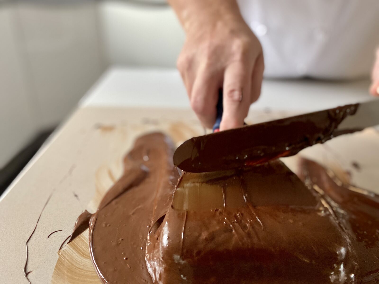 Apple iPhone 11 sample photo. Slab tempering, marble, chocolate photography