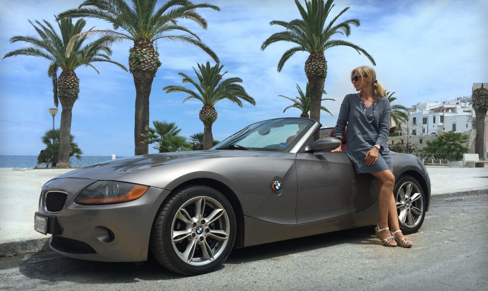 iPhone 6 Plus back camera 4.15mm f/2.2 sample photo. Sports car, convertible, woman photography