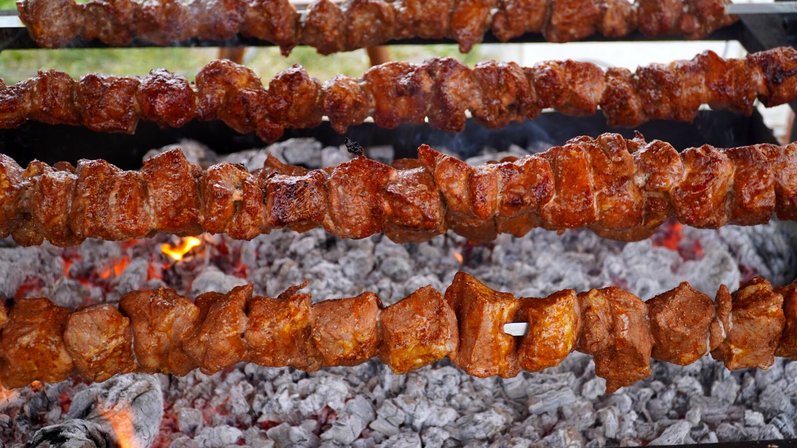 Sony E PZ 18-105mm F4 G OSS sample photo. Spit roast, grill, meat photography