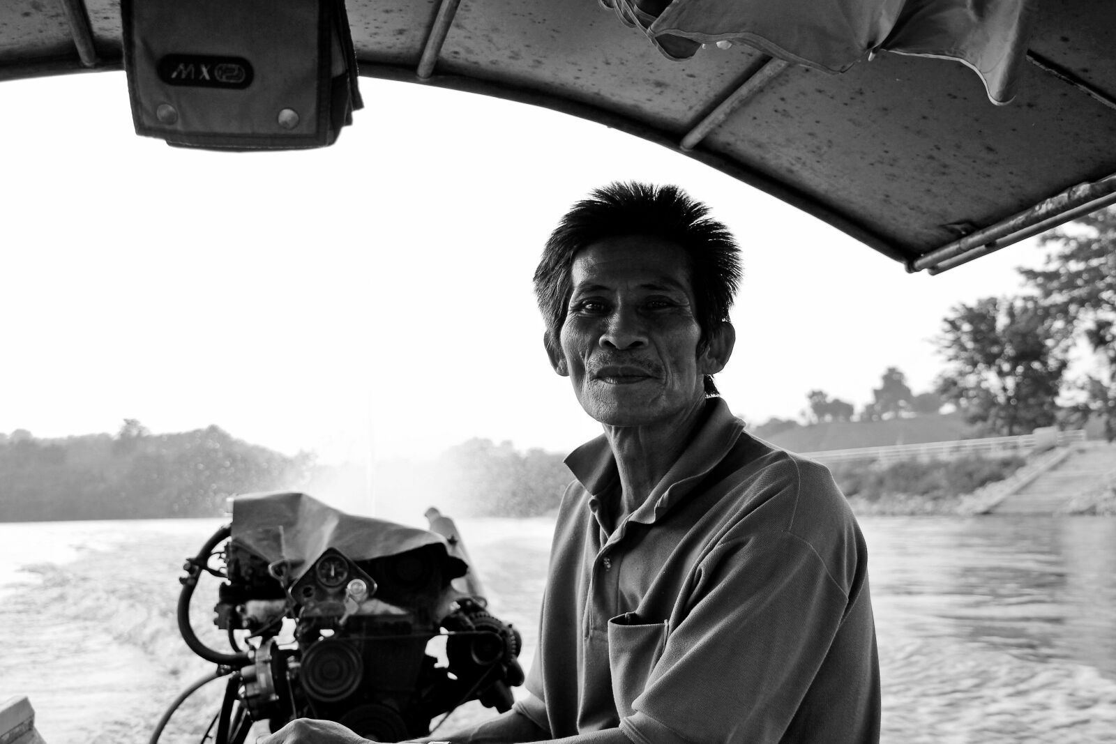 Canon EOS 60D sample photo. Man, boat, browse photography