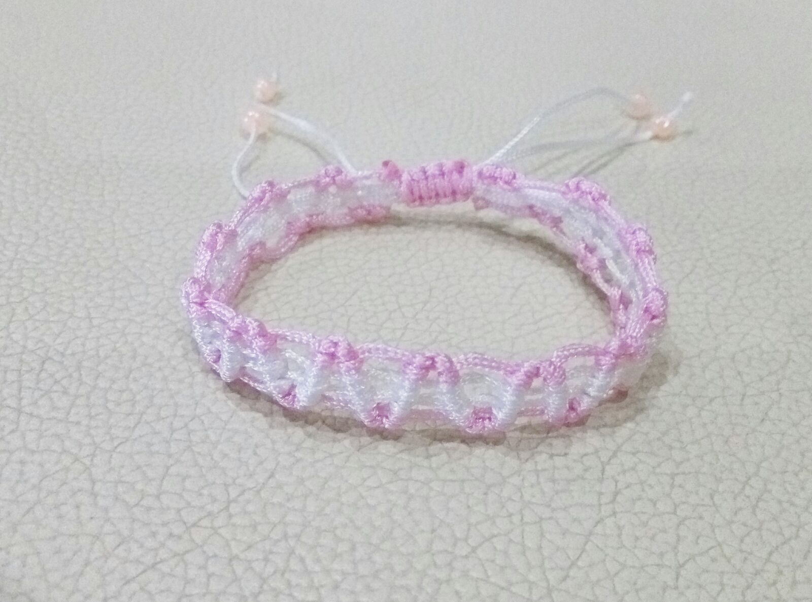Meizu m1 metal sample photo. Bracelet, braided rope, pink photography