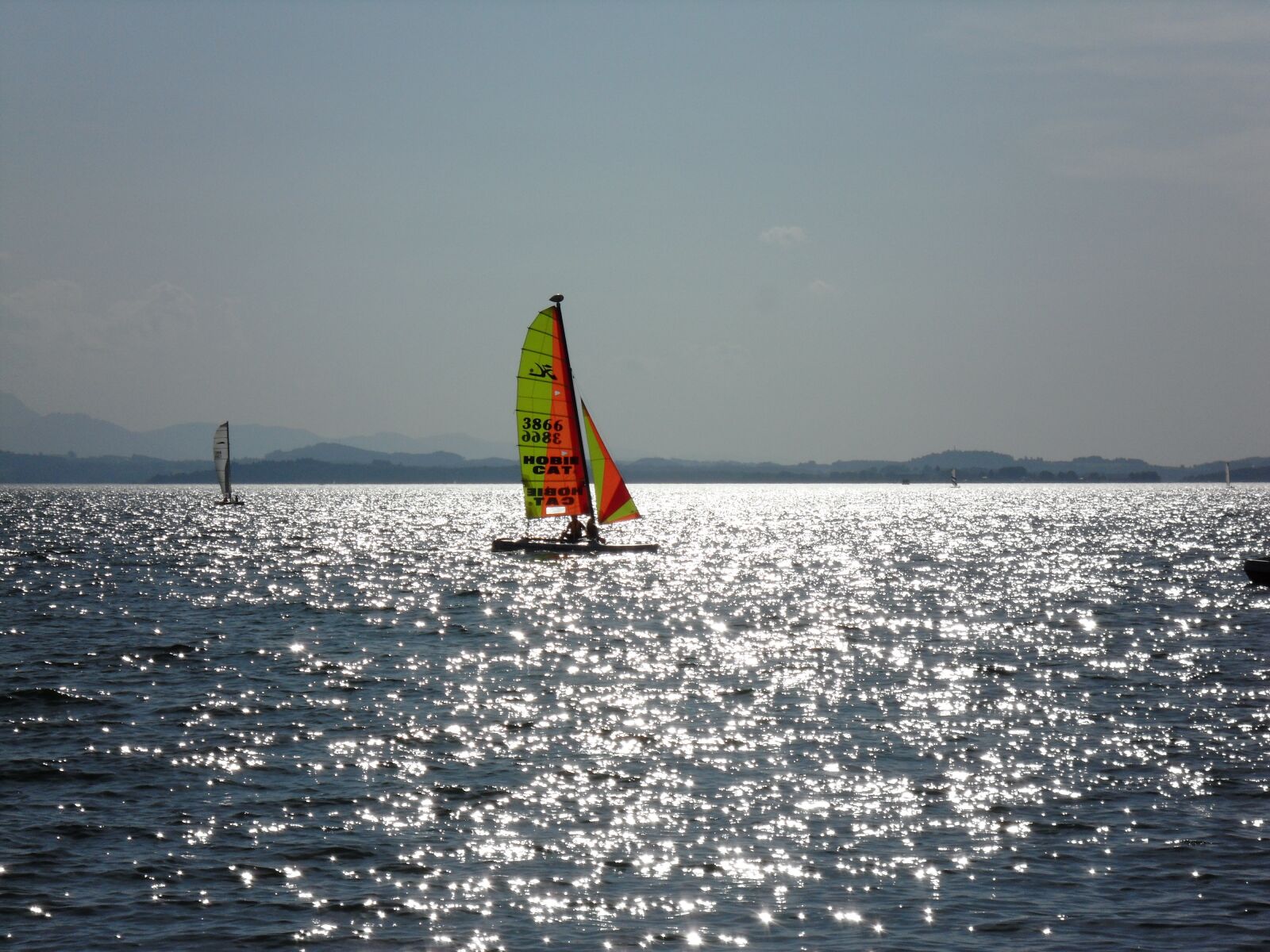 Samsung WB1000 / VLUU WB1000 /  TL320 sample photo. Lake, surf, summer photography