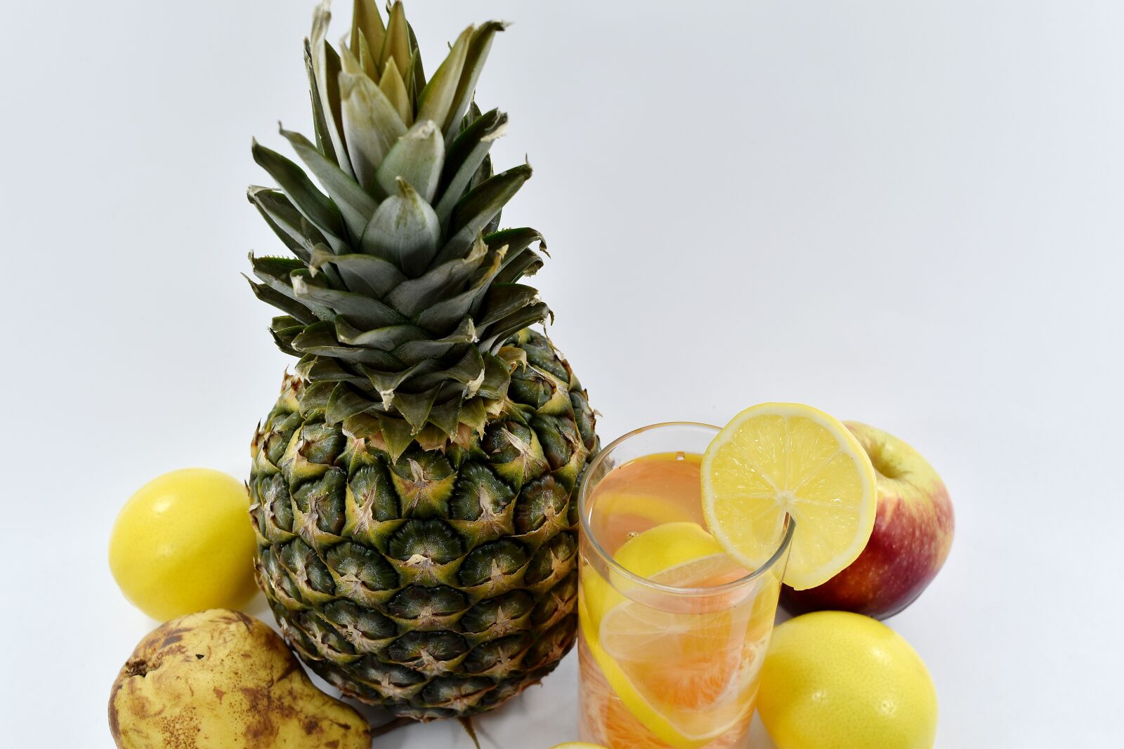 Nikon D5500 sample photo. Lemonade, mandarin, pear, pineapple photography