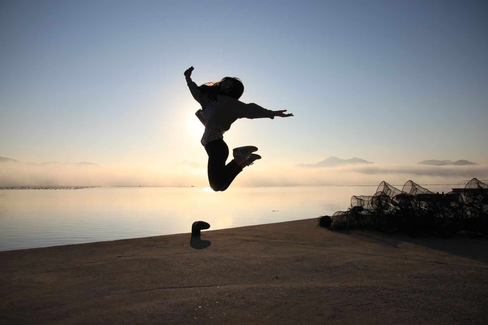 Canon EOS 500D (EOS Rebel T1i / EOS Kiss X3) sample photo. Jump, sun, sandal-island photography
