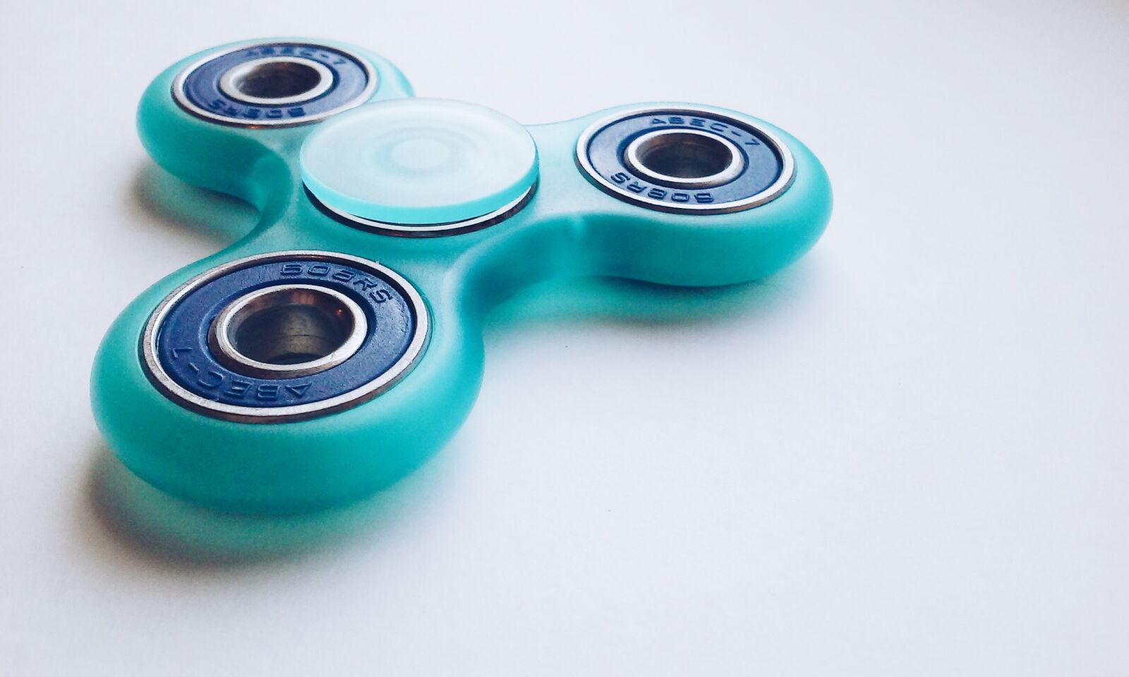 LG F60 sample photo. Fidget spinner, toy, game photography