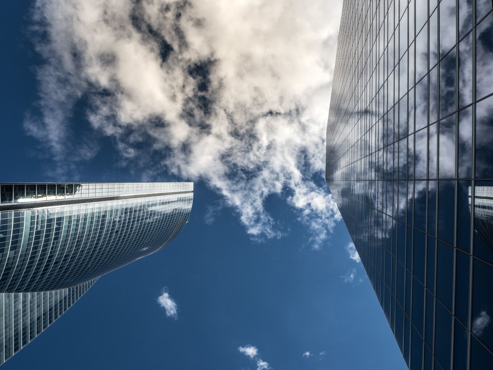 Olympus OM-D E-M5 II sample photo. Torres, madrid, sky photography
