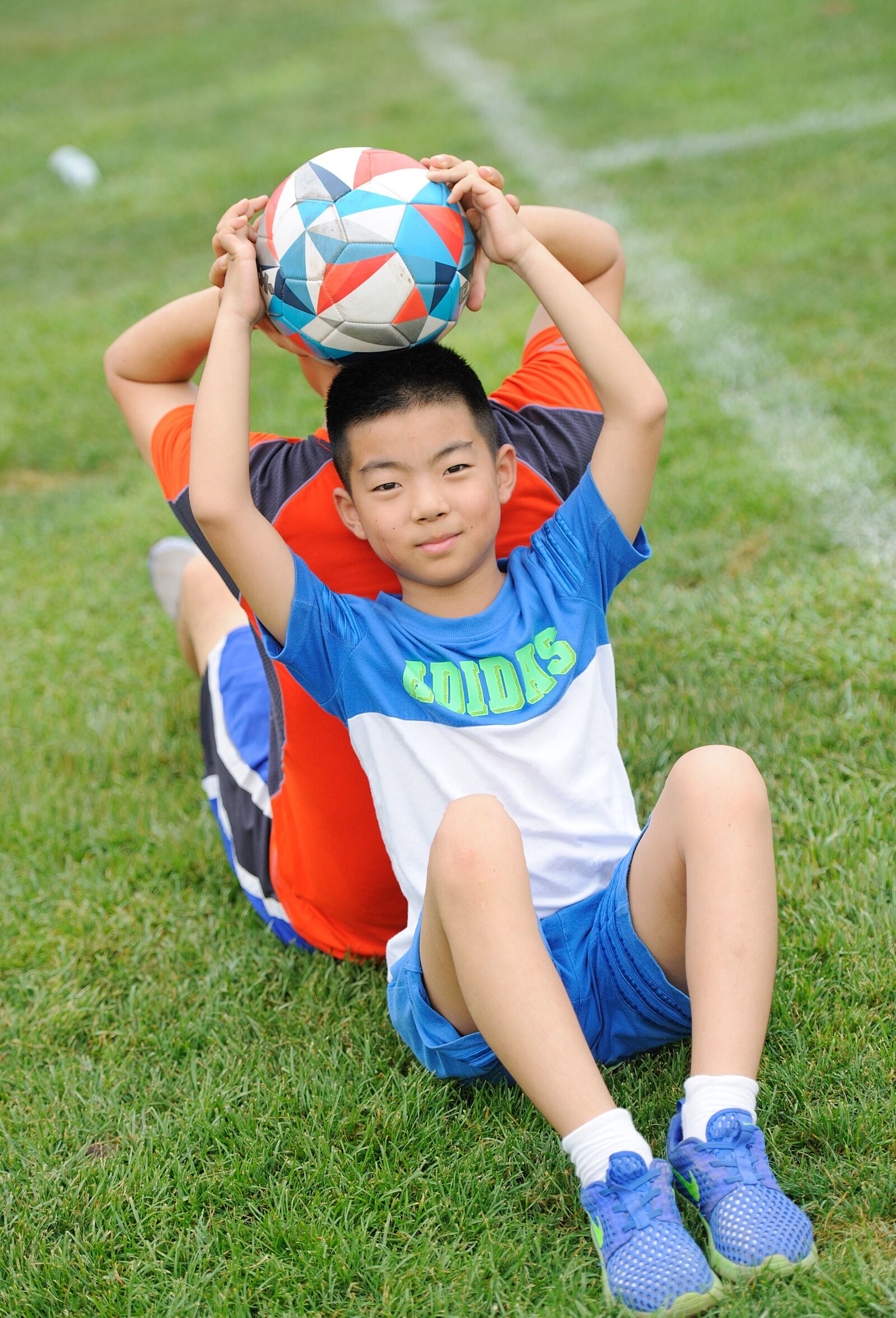 Nikon D700 sample photo. Football, teenager, greenery photography