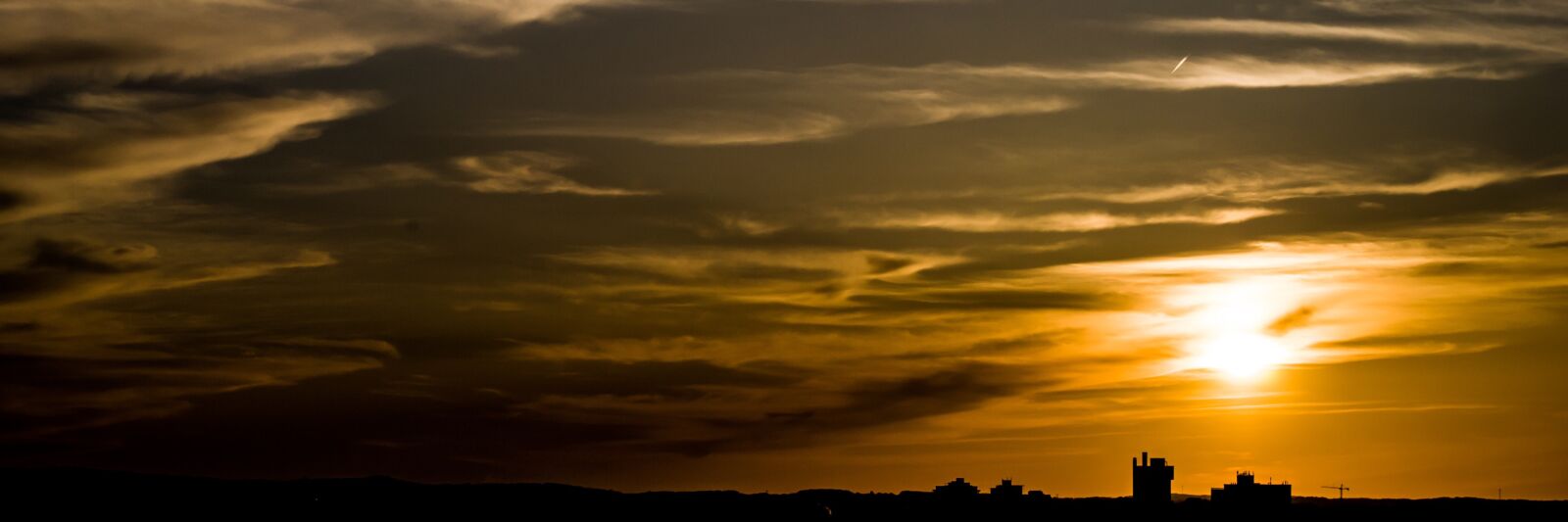 Nikon D3000 sample photo. Sunset, city, clouds photography
