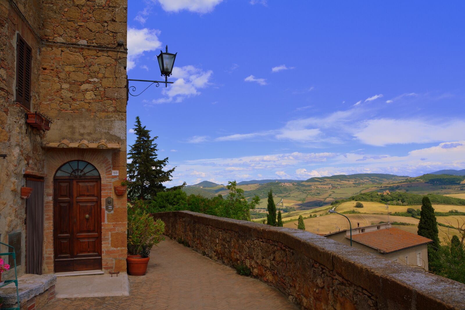 Nikon D7100 sample photo. Glimpse, house, landscape photography