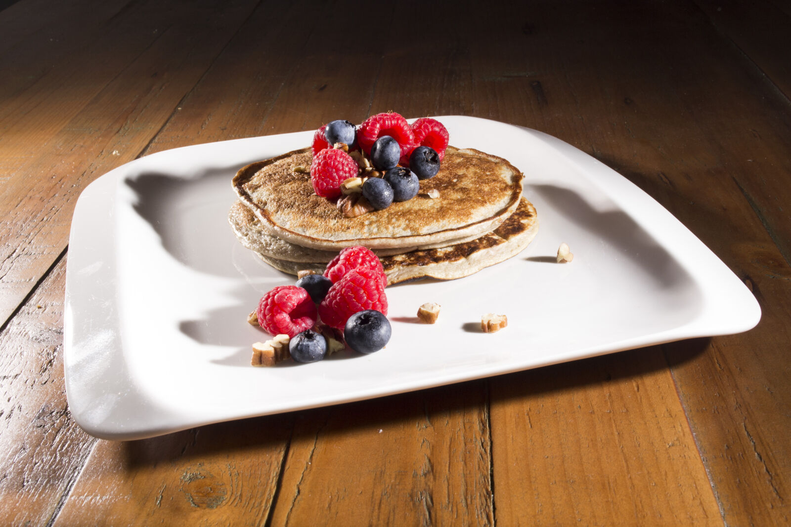 Nikon D3100 sample photo. Banana, berry, bowl, breakfast photography