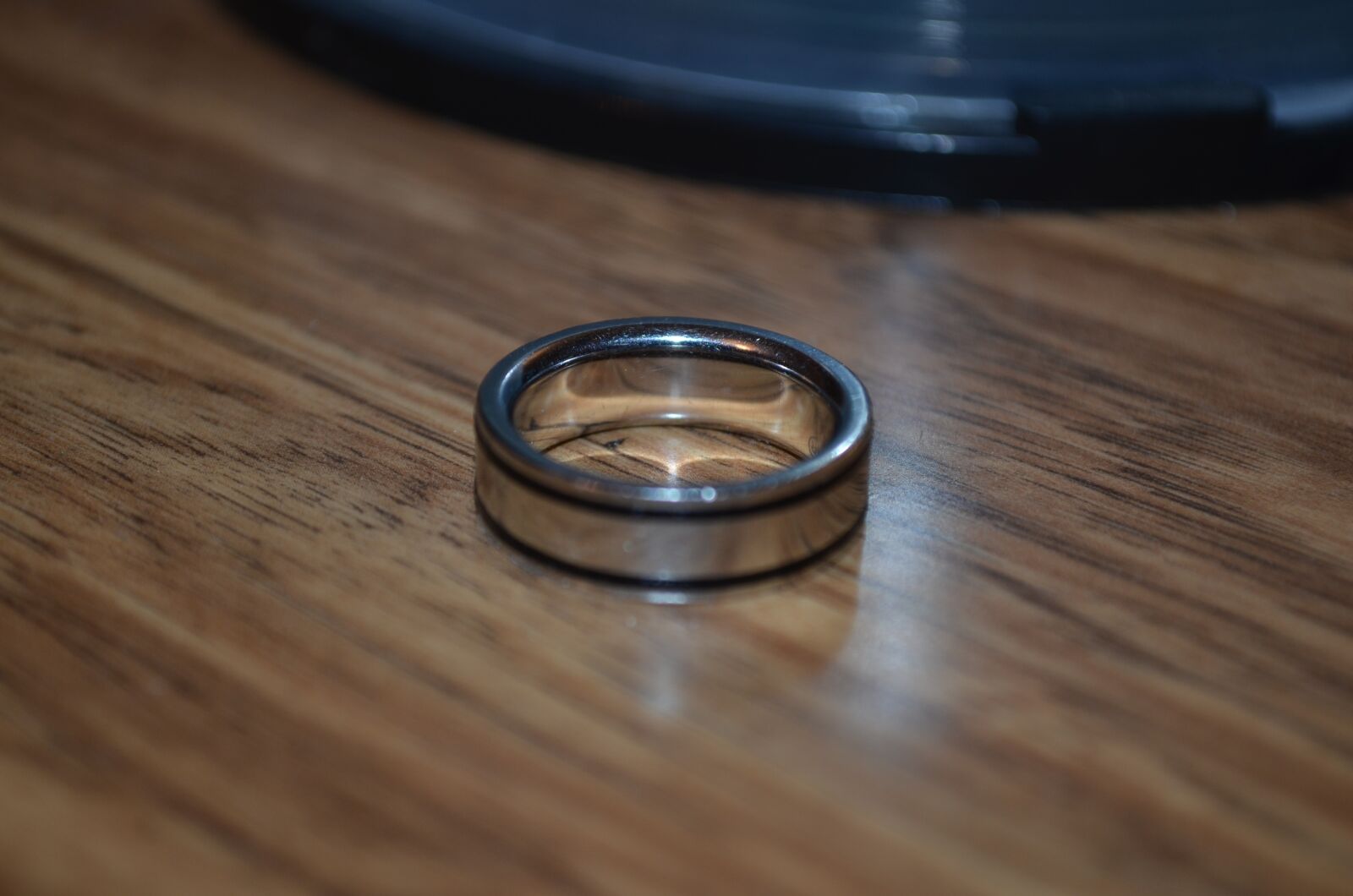 Nikon D5100 sample photo. Ring, silver, table photography