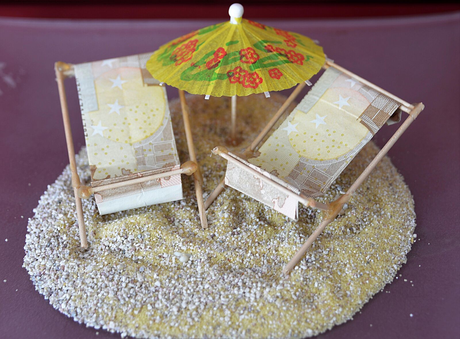 Nikon D610 sample photo. Bank note, sand, sun photography