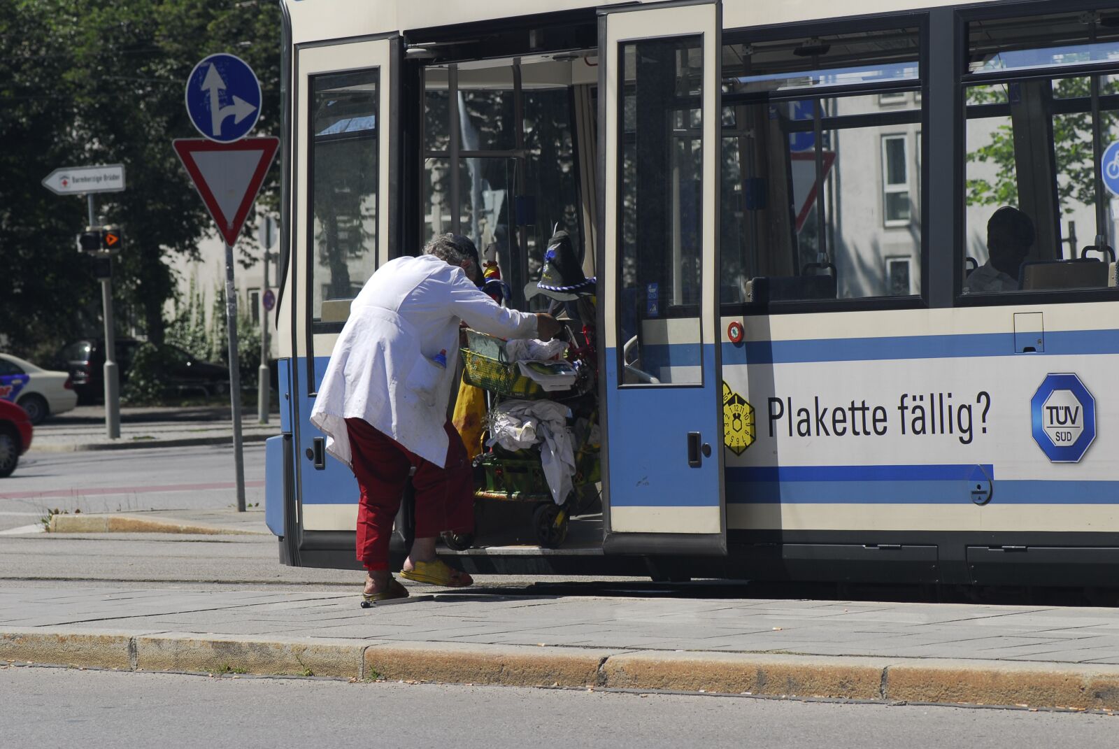 Nikon D200 sample photo. Tram, homeless man, homeless photography