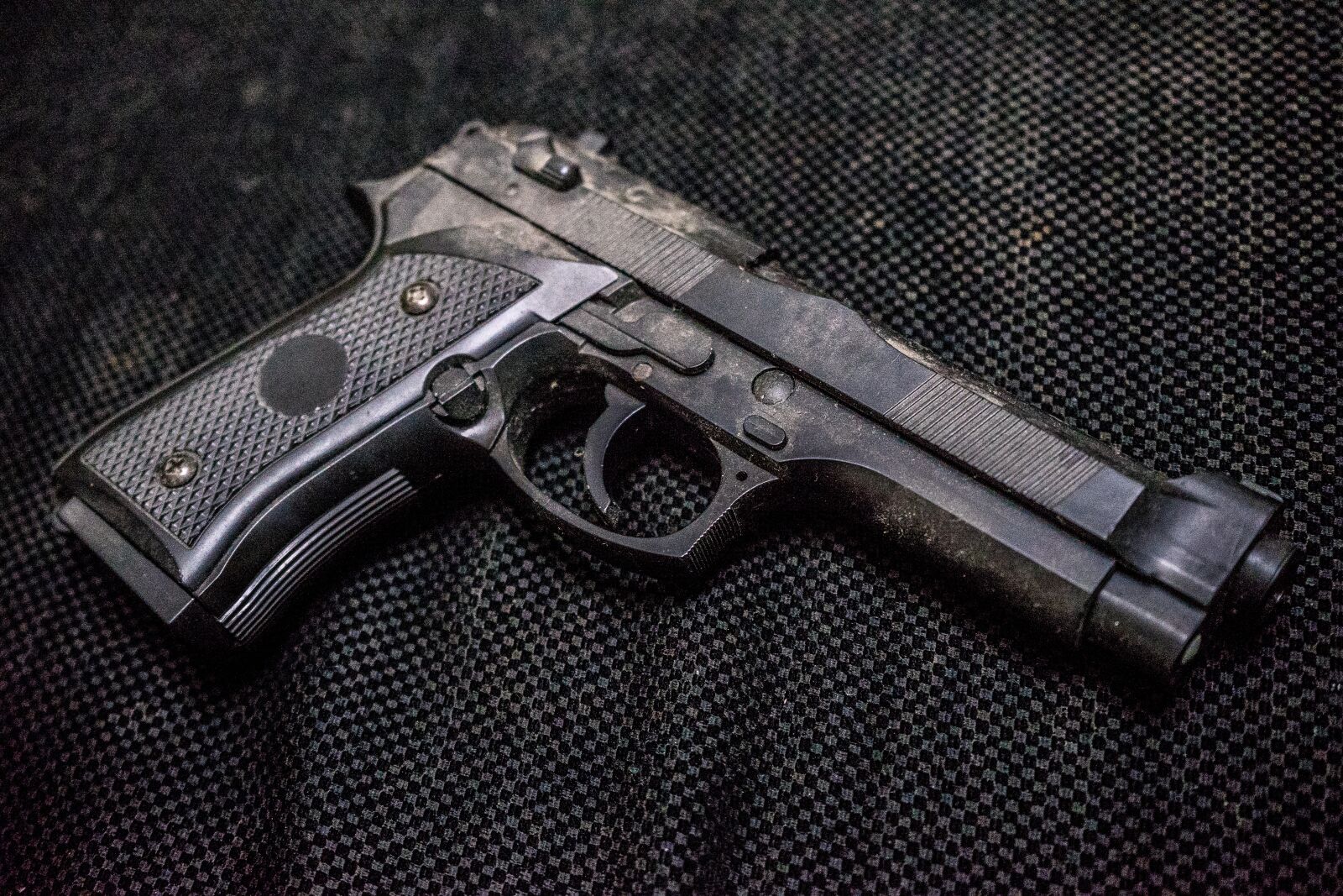 Sony a7 + Sony FE 28-70mm F3.5-5.6 OSS sample photo. Guns, gun, metal photography