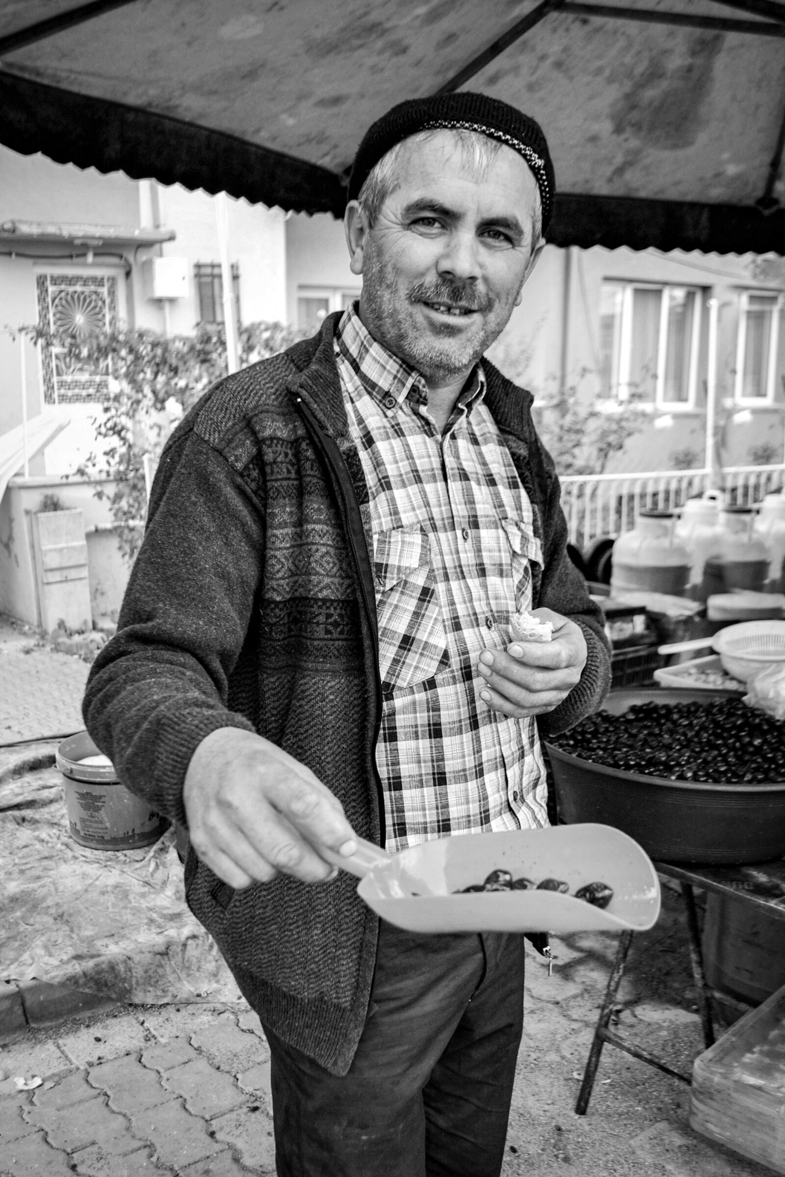 Nikon D3000 sample photo. Man, people, olives photography
