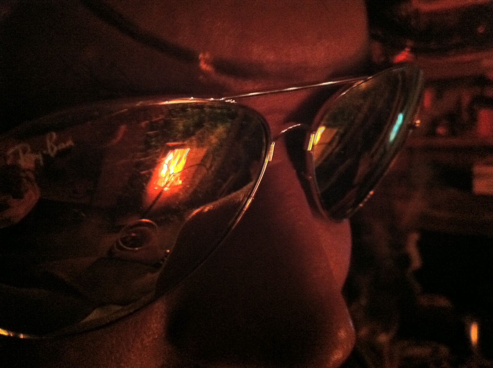 iPhone 4 back camera 3.85mm f/2.8 sample photo. Dark, glasses, look, fire photography