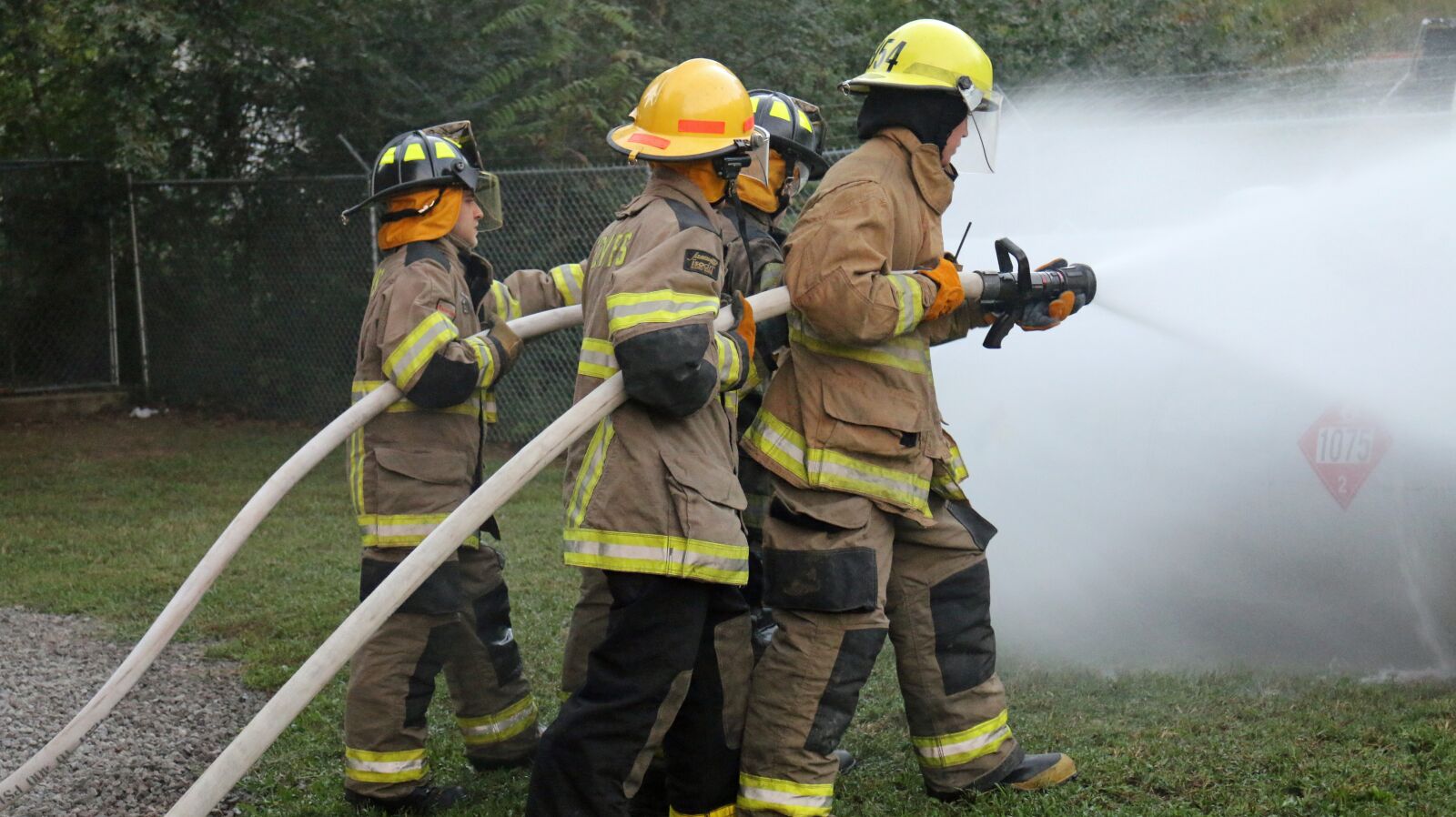 Canon EOS 70D sample photo. Fire fighters, hose training photography