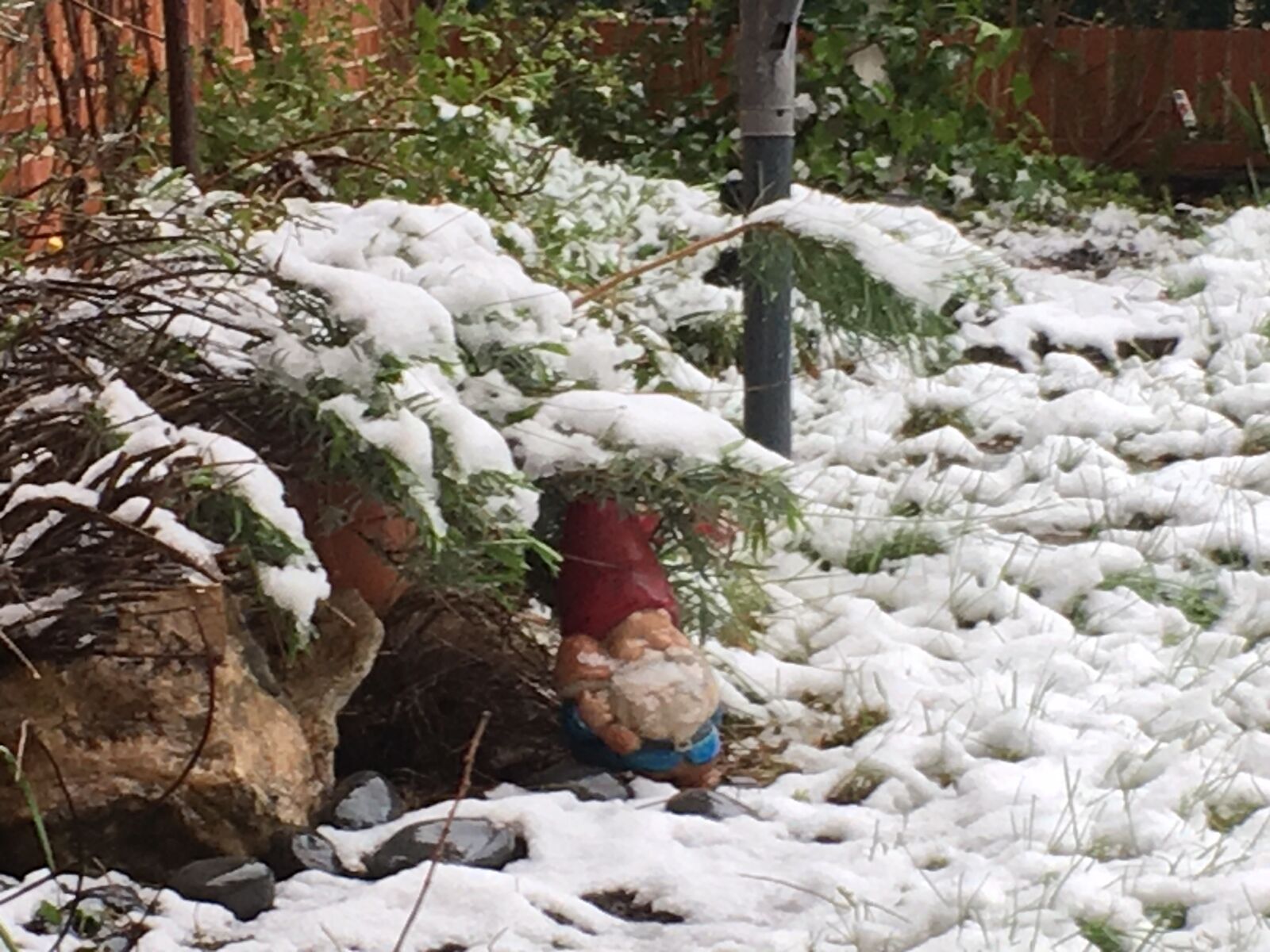 Apple iPhone 6s sample photo. Snow, gnome, dwarf photography