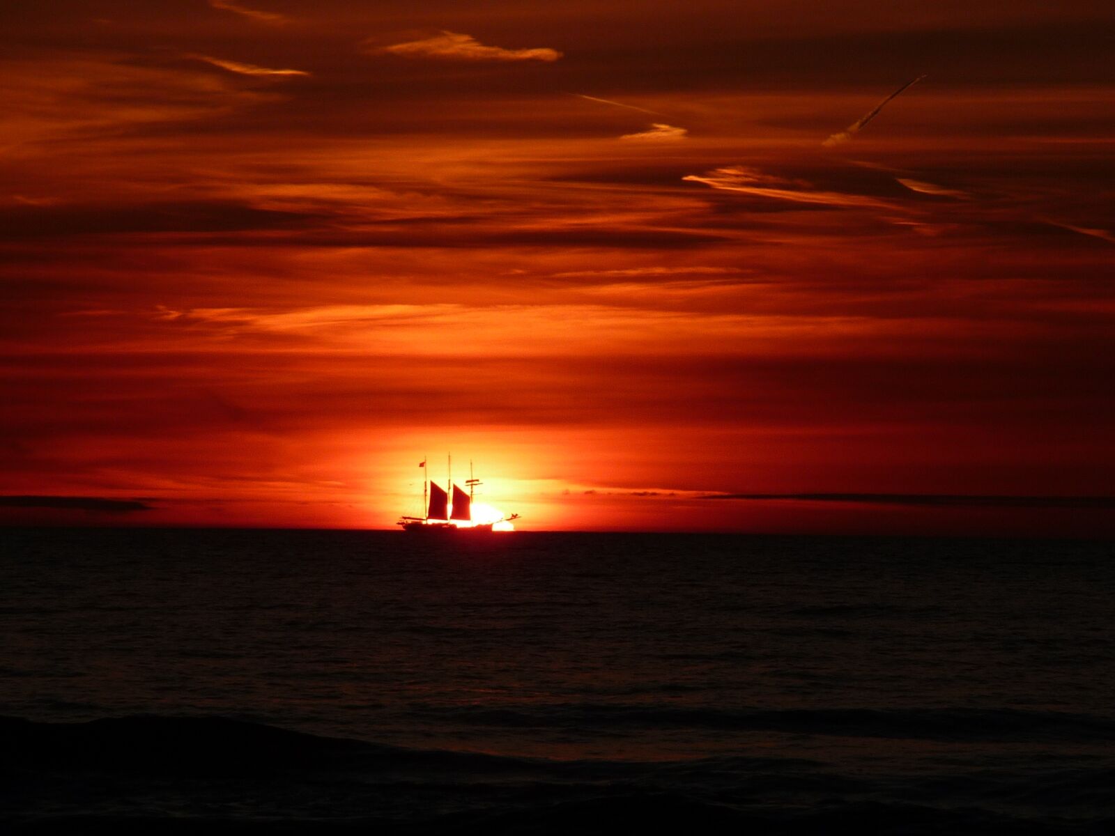 Panasonic Lumix DMC-TZ4 sample photo. Sunset, sailing boat, sea photography