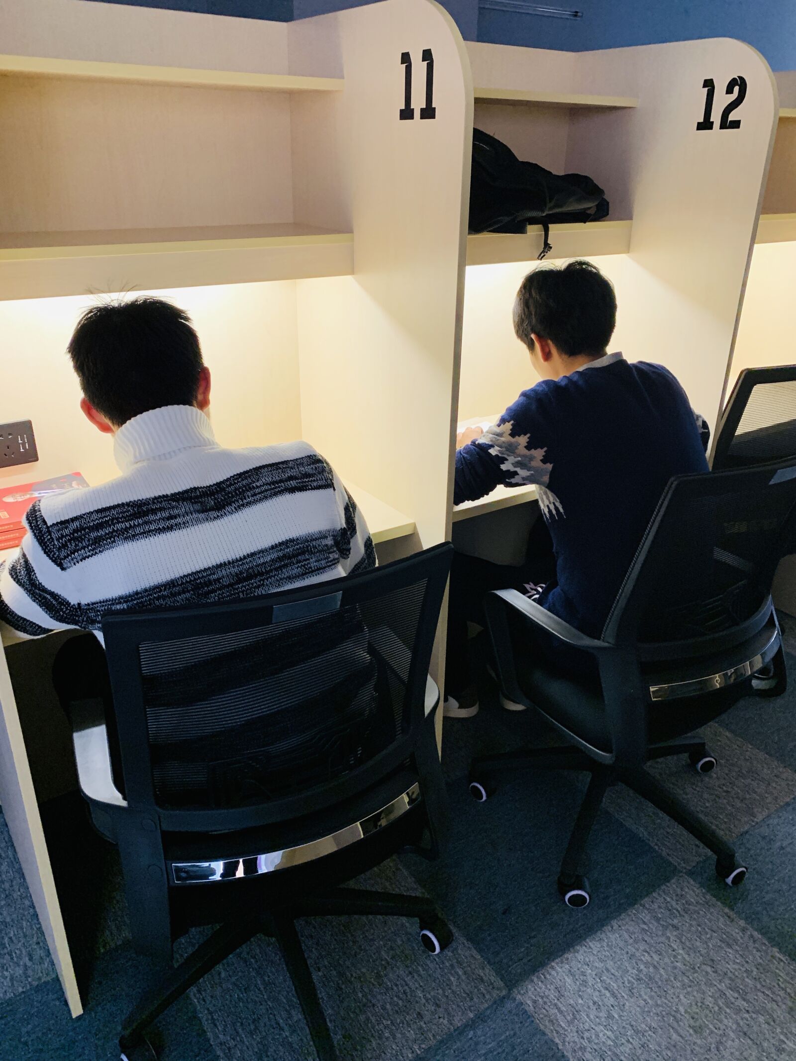 iPhone XS Max back dual camera 4.25mm f/1.8 sample photo. Black group study room photography