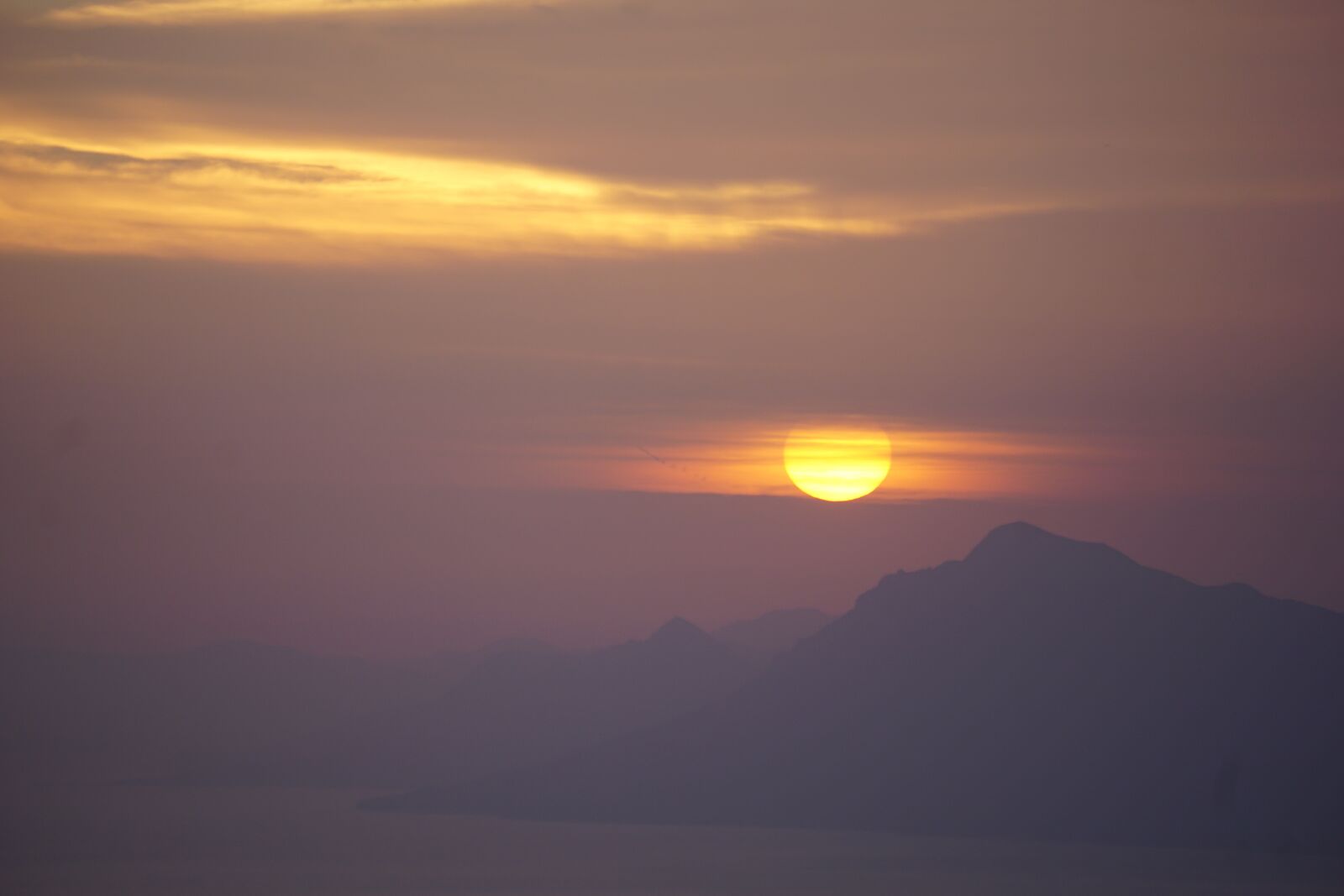 Sony E 55-210mm F4.5-6.3 OSS sample photo. Sea, sunset, mountains photography