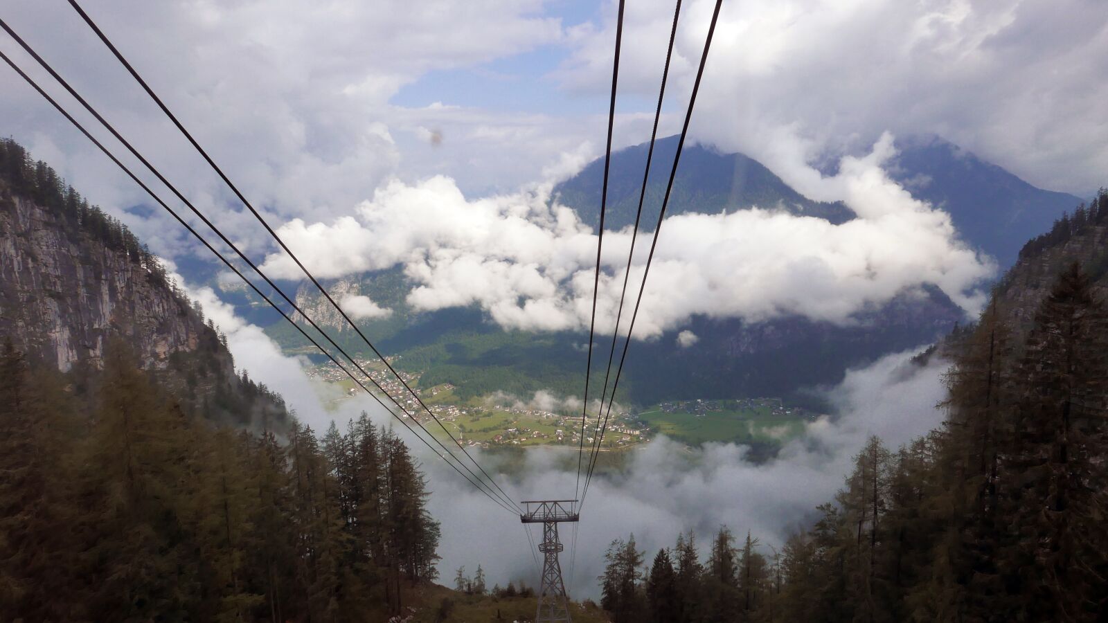 Panasonic Lumix DMC-LX100 sample photo. Clouds, lift, alpine photography