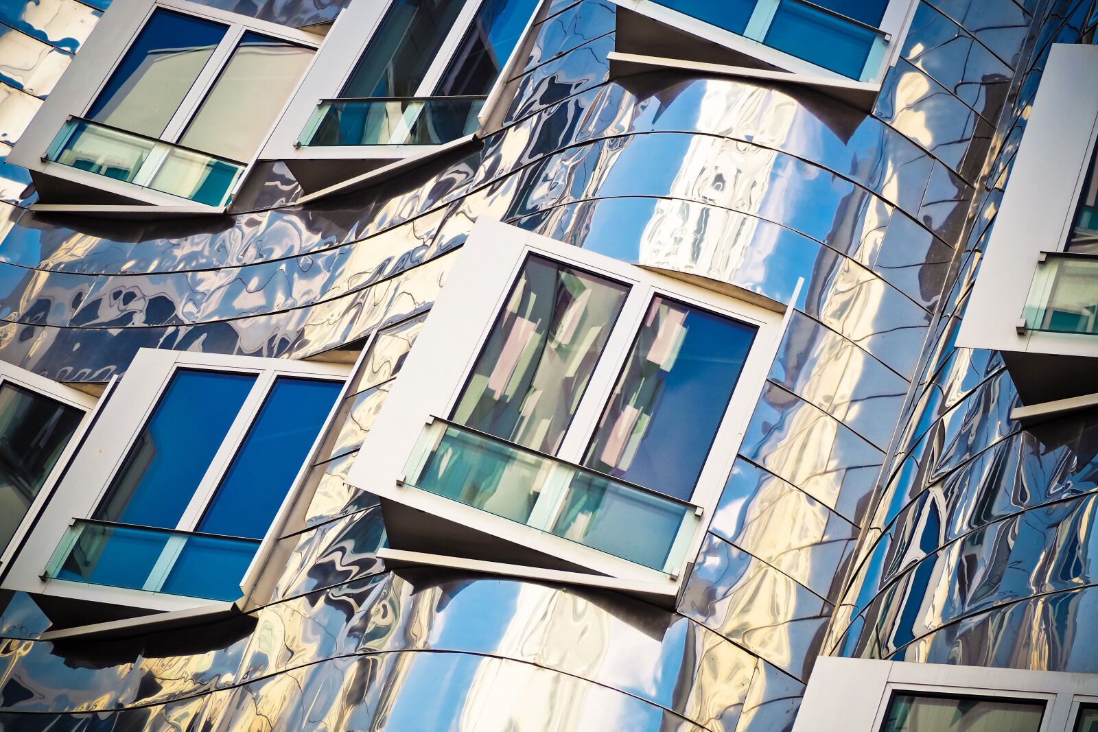 Olympus OM-D E-M10 sample photo. Window, gehry buildings, media photography