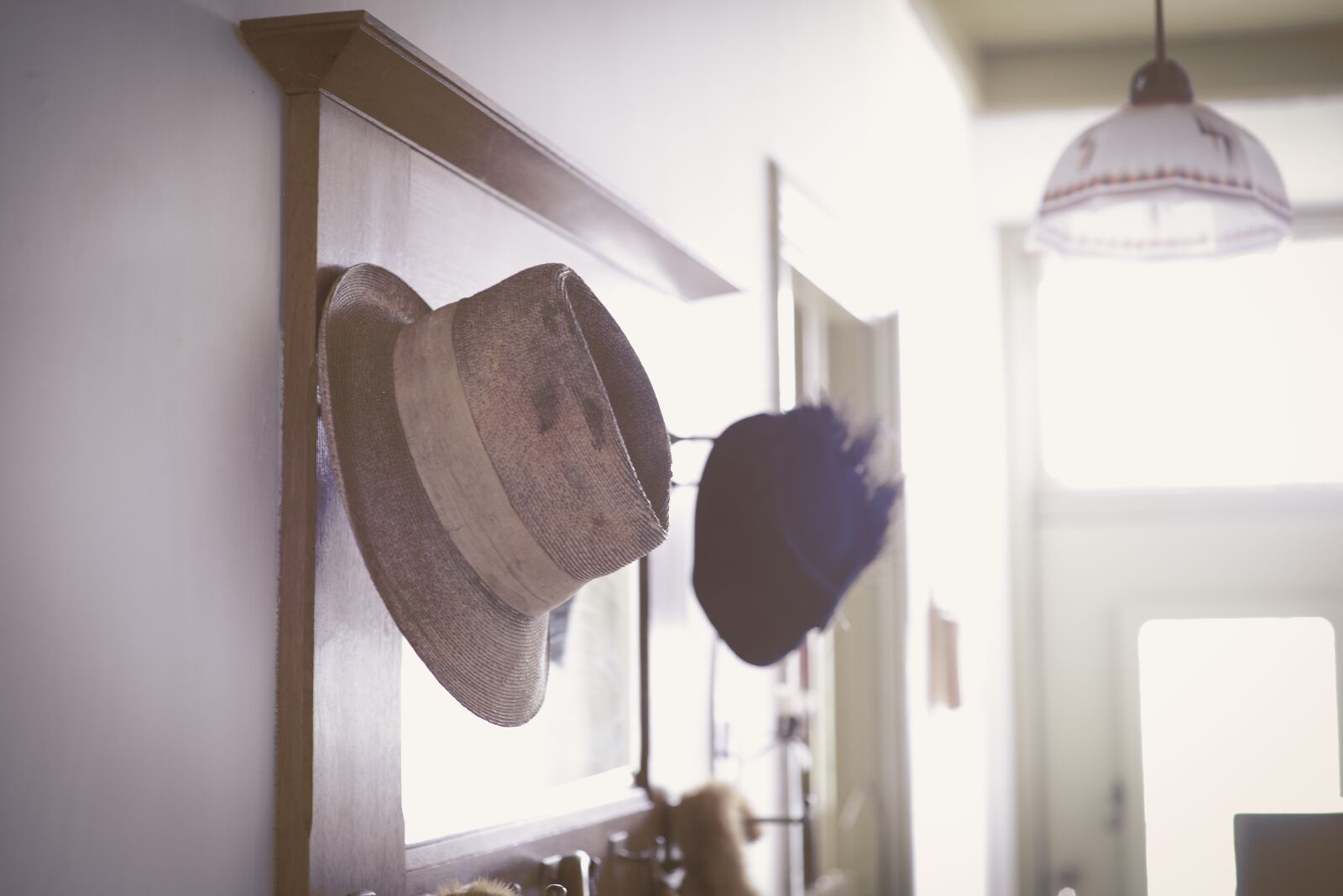 Nikon D610 sample photo. Hanging, hats, vintage photography