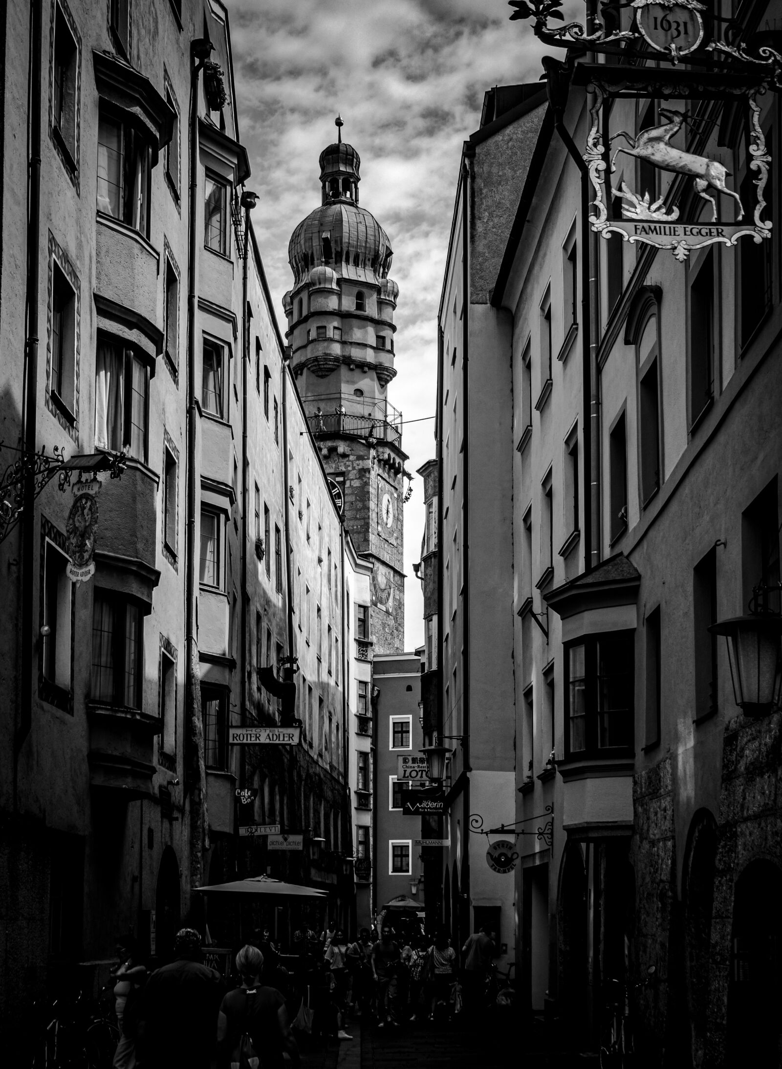 Olympus OM-D E-M10 II sample photo. City tower, alley, tyrol photography