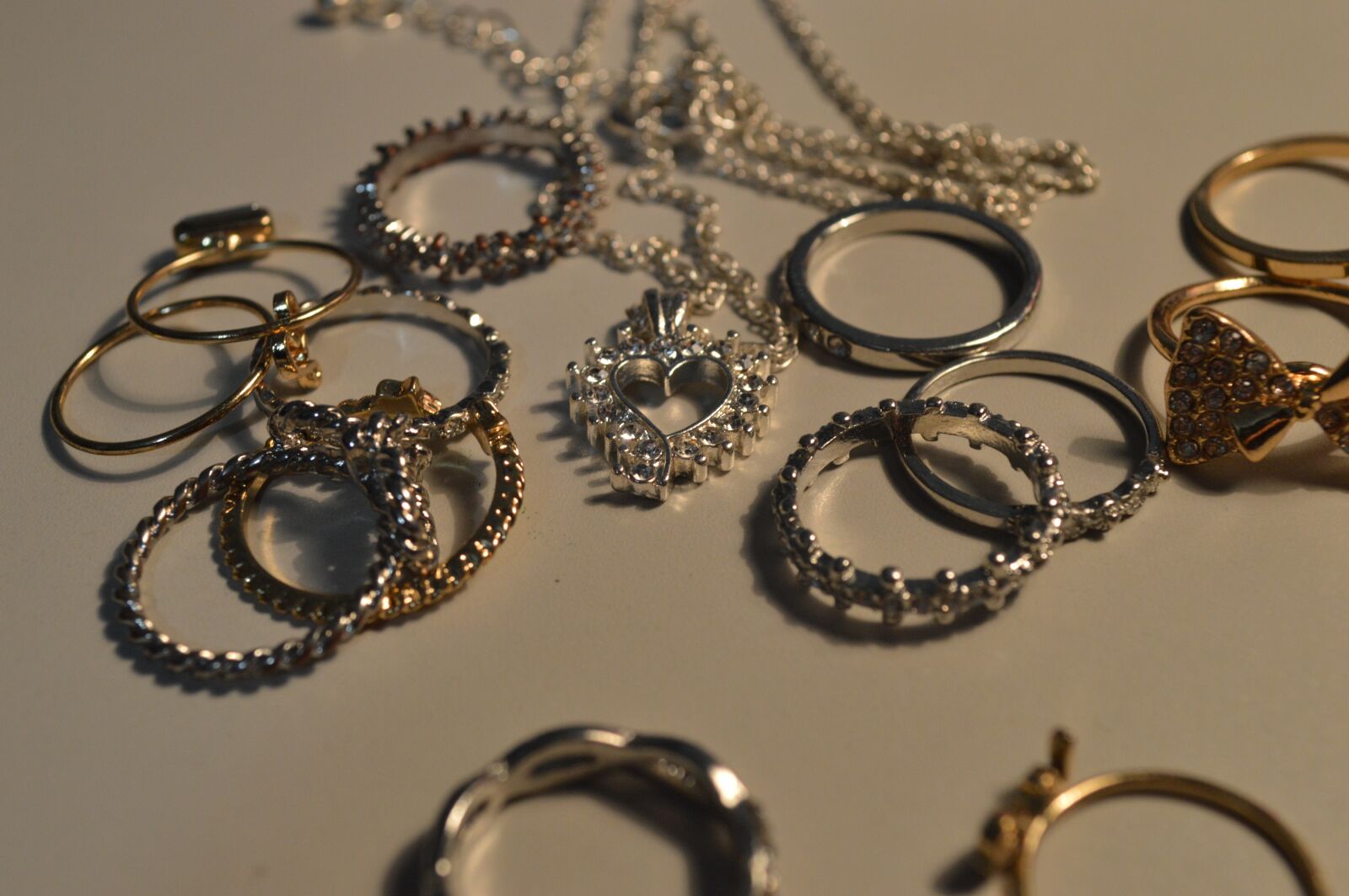 Nikon D3200 sample photo. Rings, necklace, heart photography