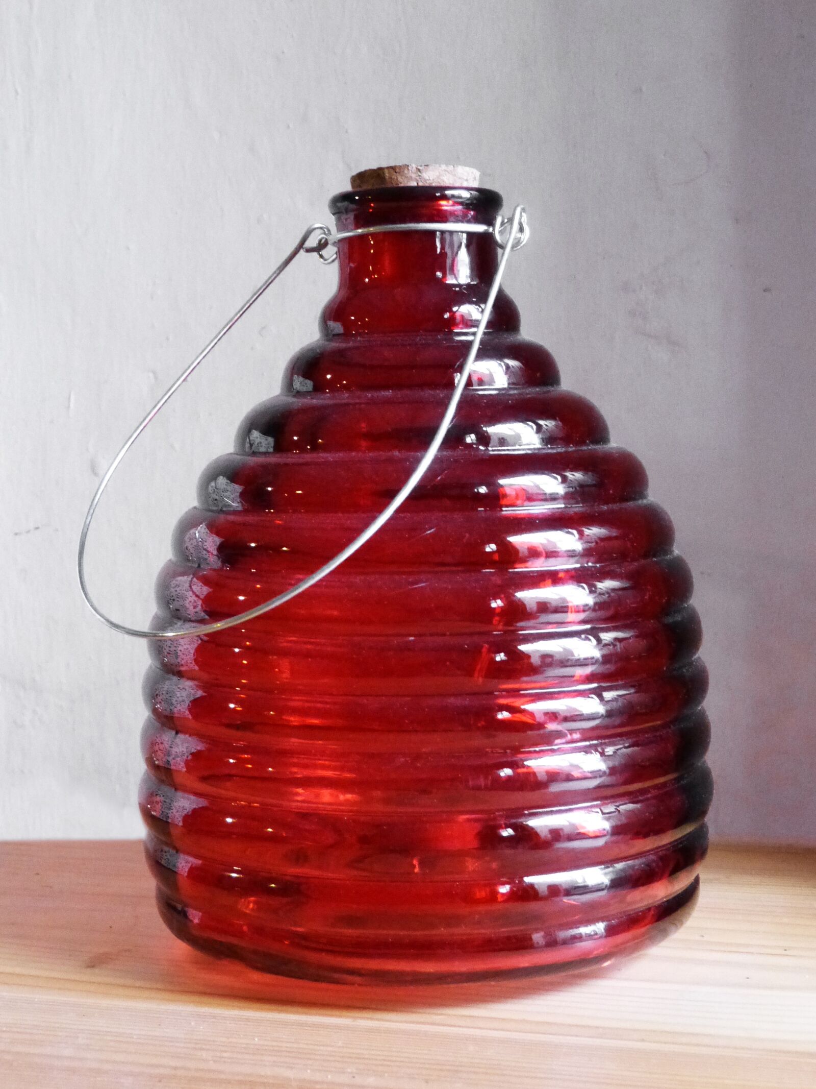Panasonic DMC-FZ62 sample photo. Bottle, decoration, red glass photography