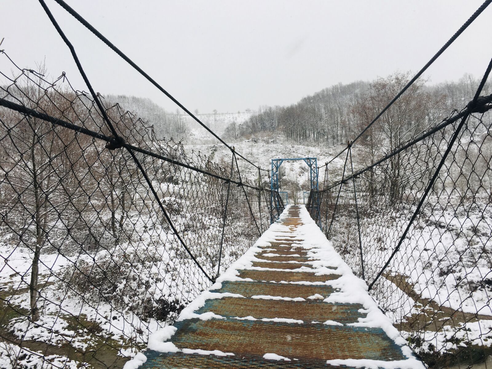 Apple iPhone 6s sample photo. Snow, bridge, snowfall photography