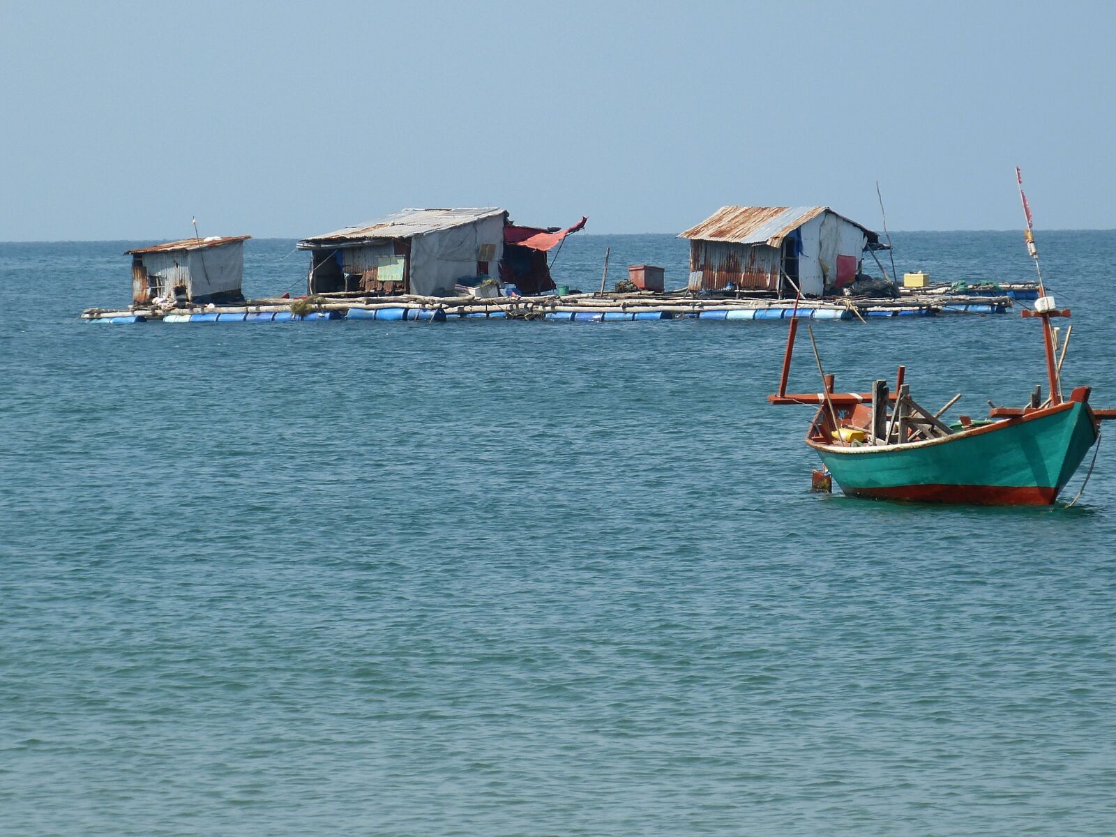 Panasonic Lumix DMC-FZ150 sample photo. Fisherman, sea, boats photography