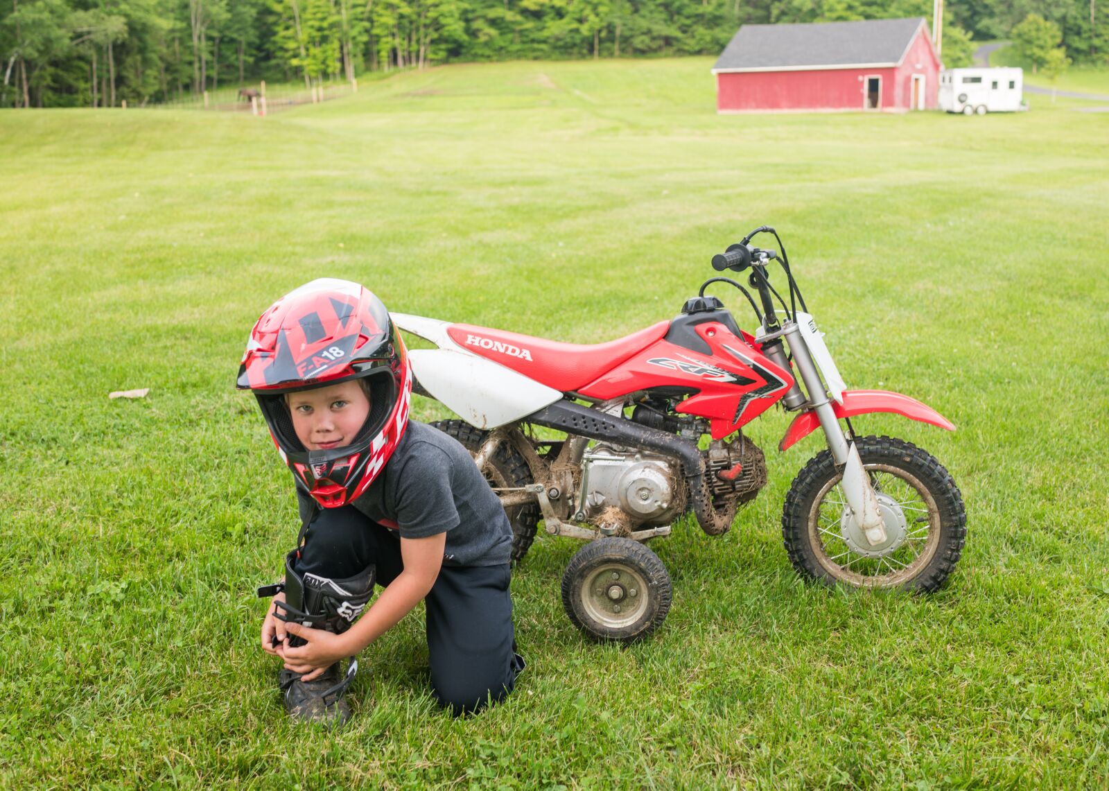 35mm F2.0 sample photo. Dirt bike, training wheels photography