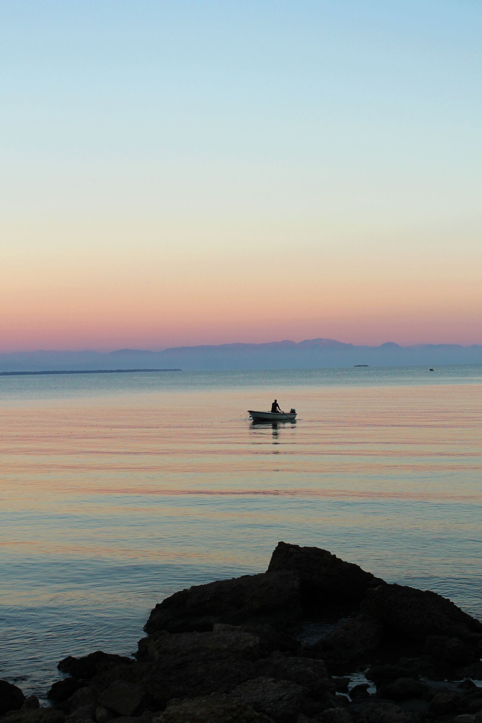 Canon EOS 1100D (EOS Rebel T3 / EOS Kiss X50) sample photo. Fisherman, sea, sky photography