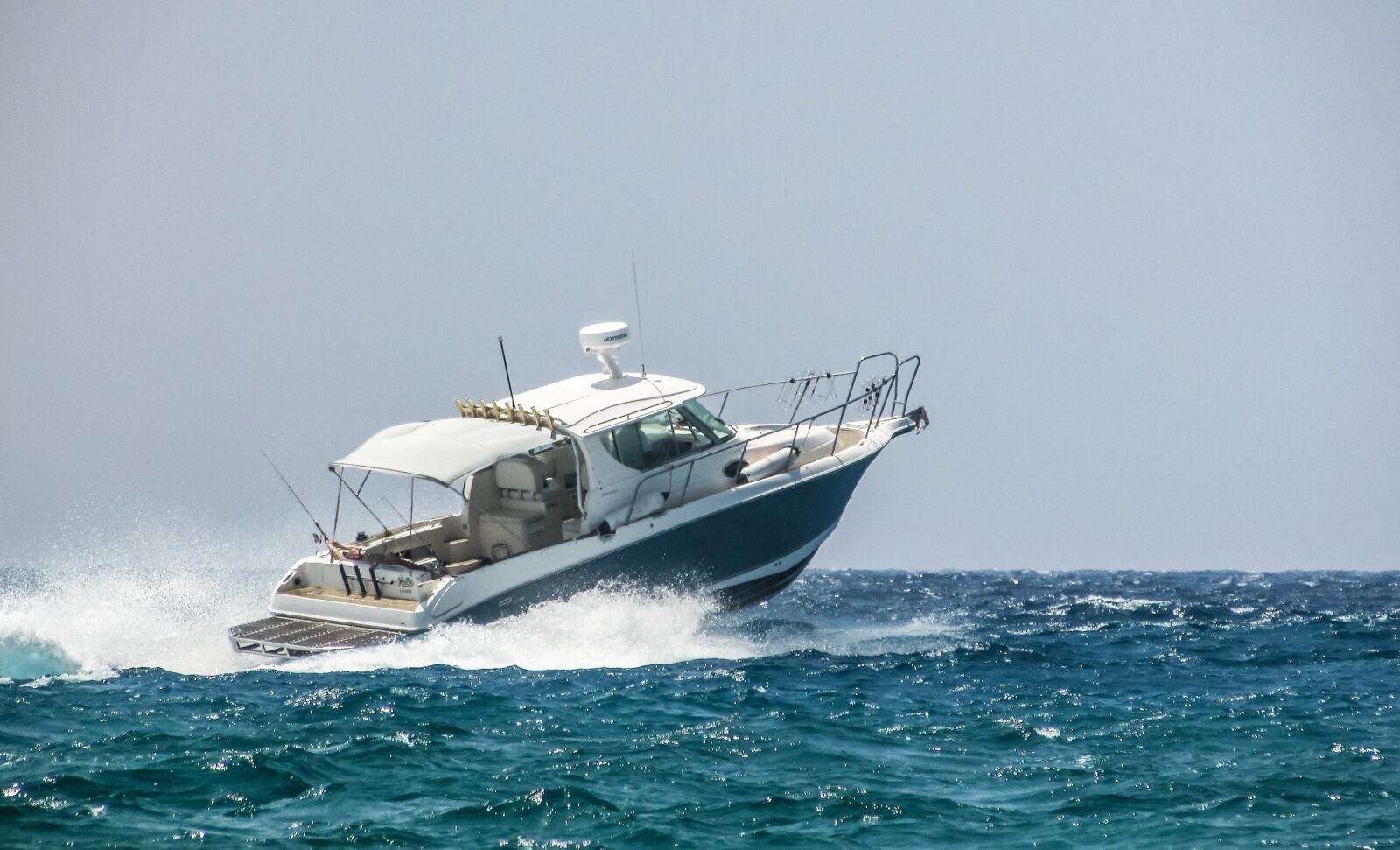 Canon PowerShot SX400 IS sample photo. Speed boat, sea, water photography