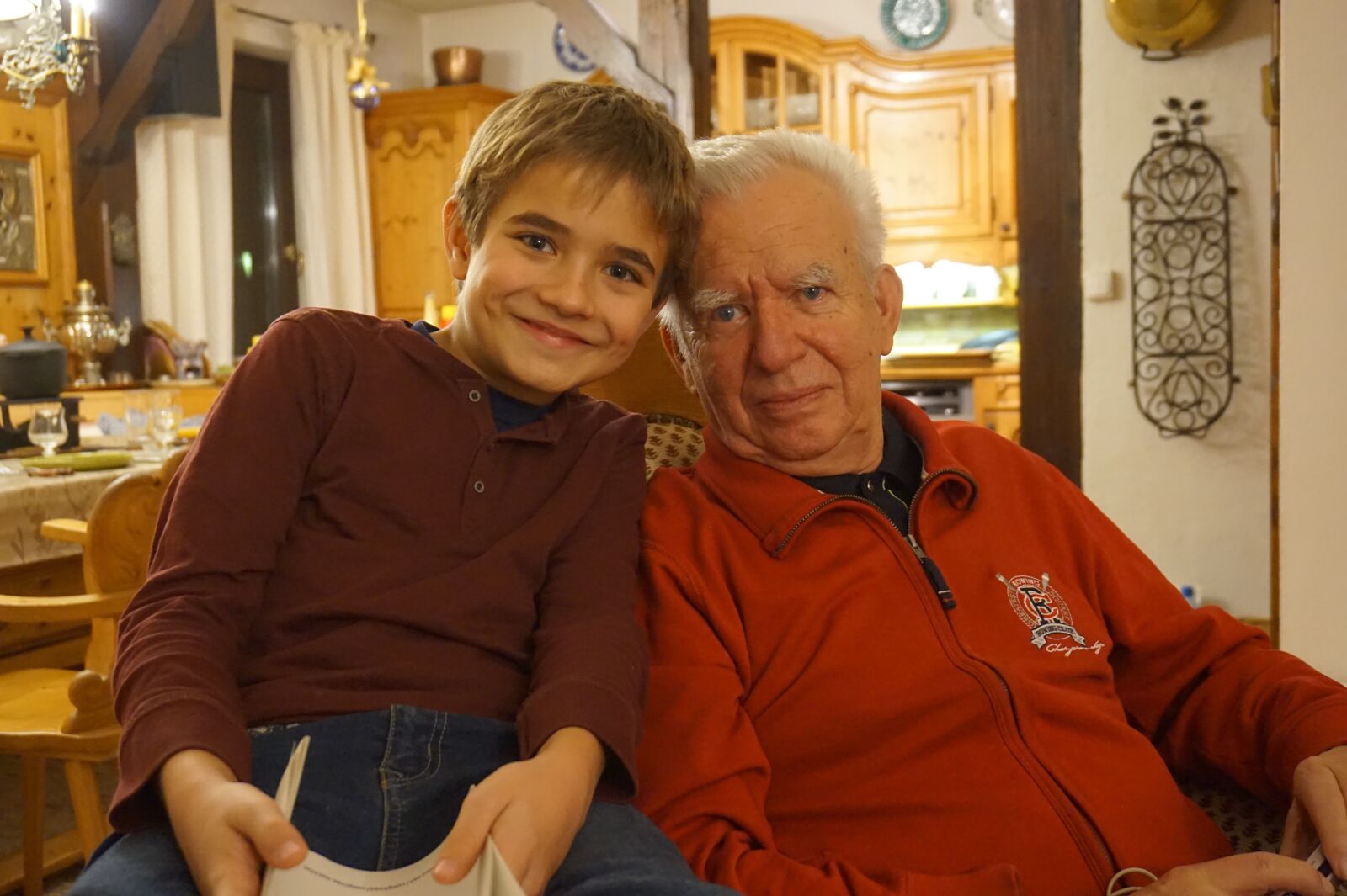 Sony Alpha a5000 (ILCE 5000) sample photo. Grandpa, boy, sitting photography