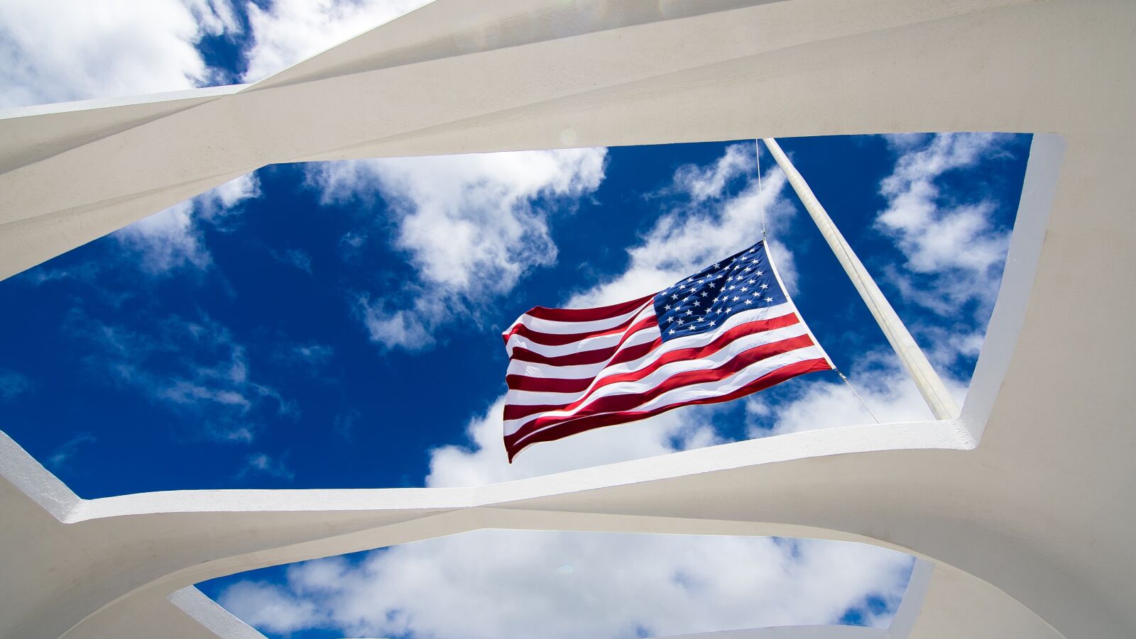 11-16mm F2.8 sample photo. Administration, banner, clouds photography