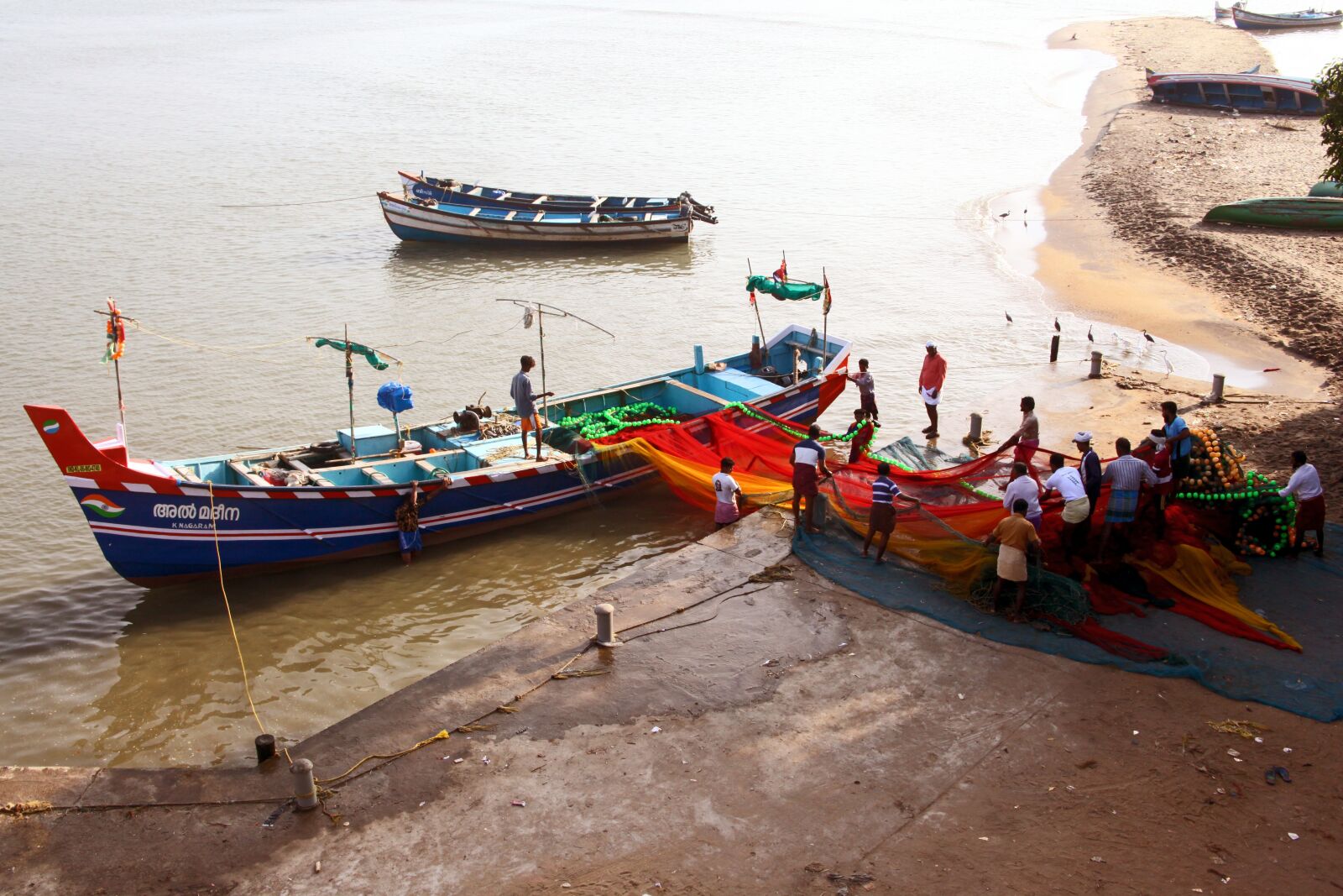 Canon EOS 5D Mark II sample photo. Boats, people, fishing photography